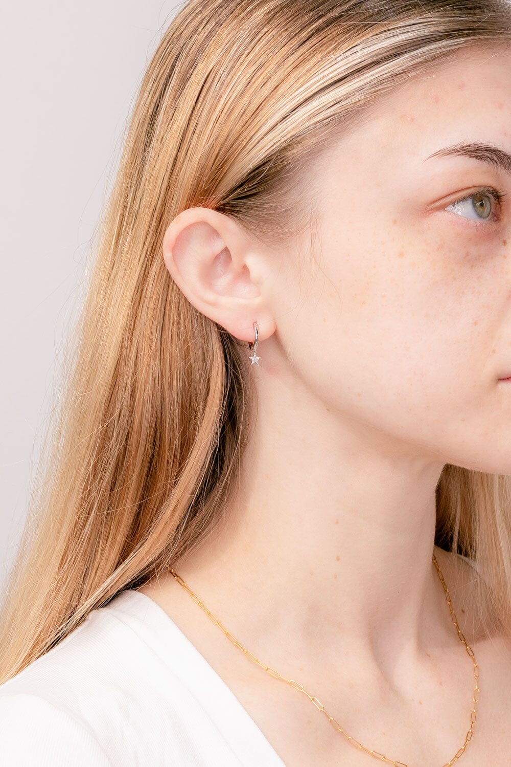 0.08 TCWRound Star Dangles Moissanite Earrings - crownmoissanite