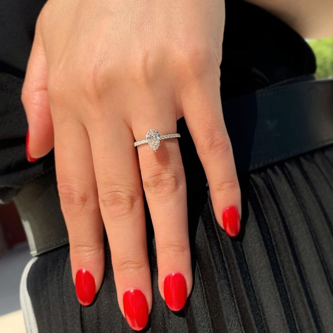 0.94 CT Pear Solitaire & Pave Setting Moissanite Engagement Ring - crownmoissanite