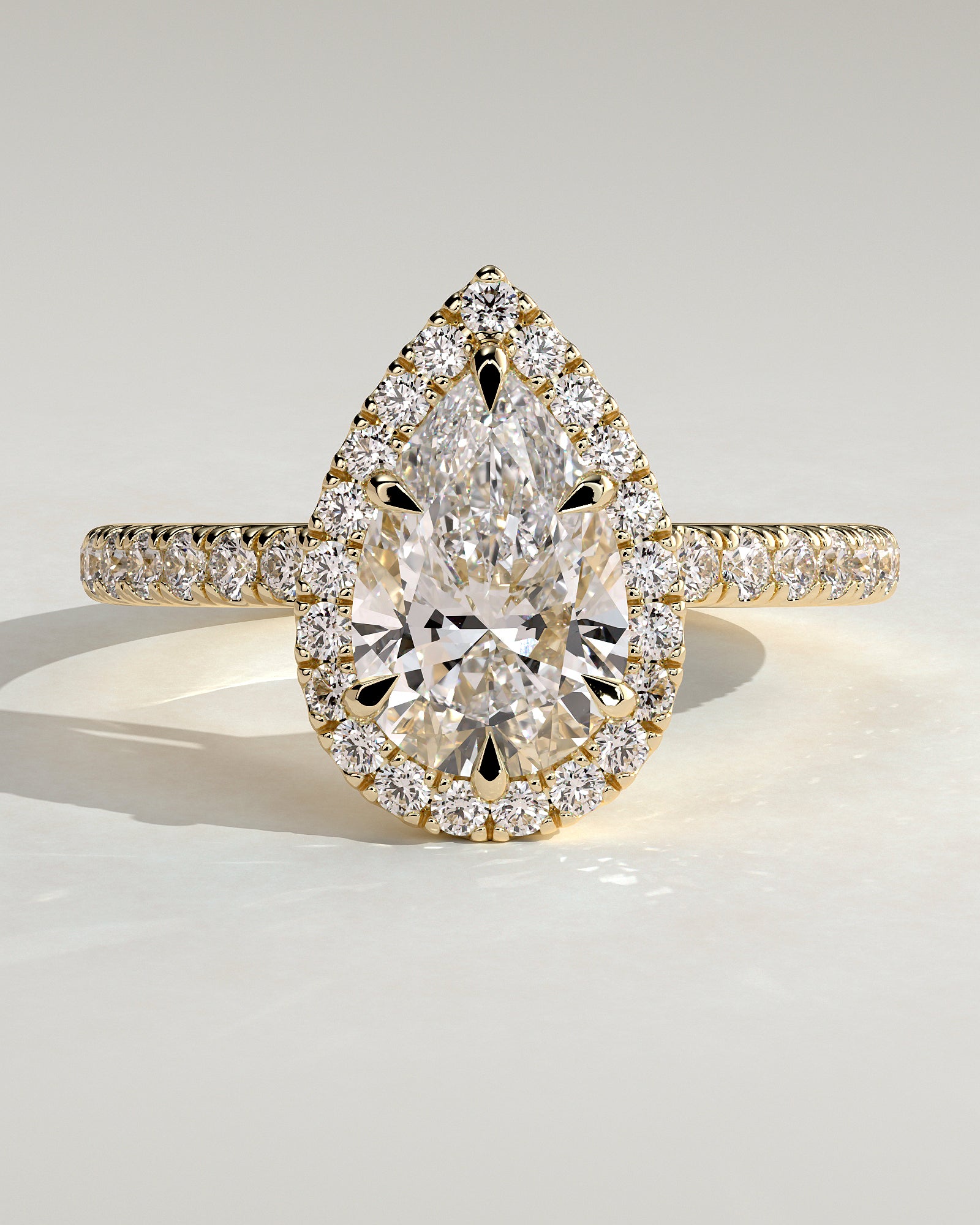 2.0 CT Pear Cut Moissanite Halo with Pavé Engagement Ring