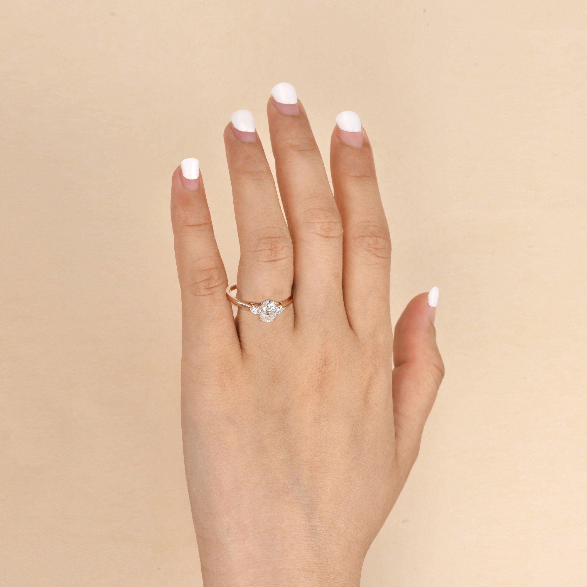 0.94 CT Oval Shaped Moissanite Three Stones Engagement Ring - crownmoissanite