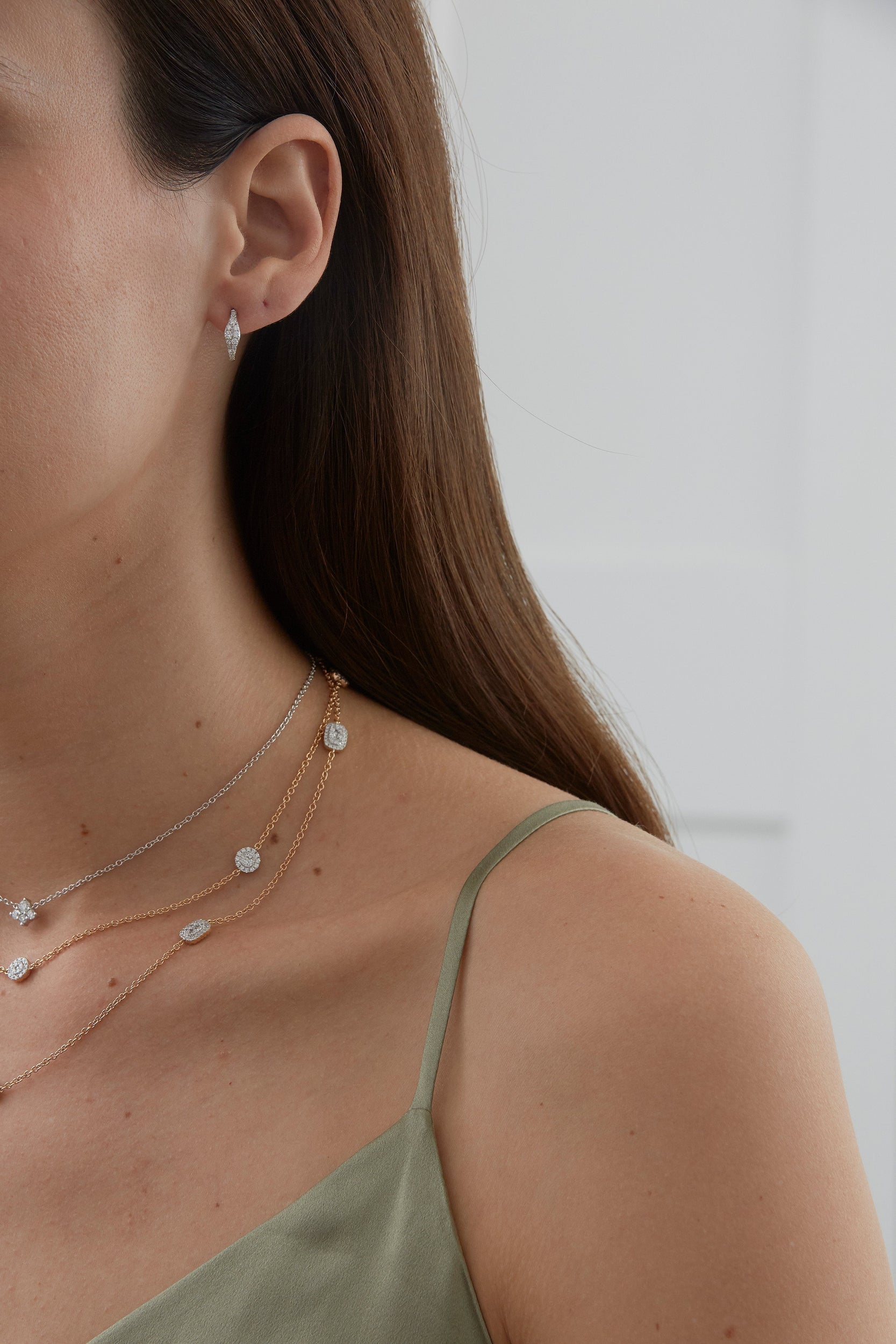 0.42 TCW Round Moissanite Diamond Huggie Earrings - crownmoissanite