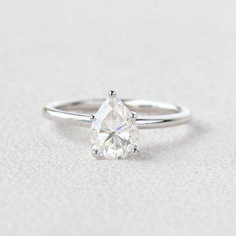 1.25 CT Pear Cut Solitaire Moissanite Engagement Ring - crownmoissanite