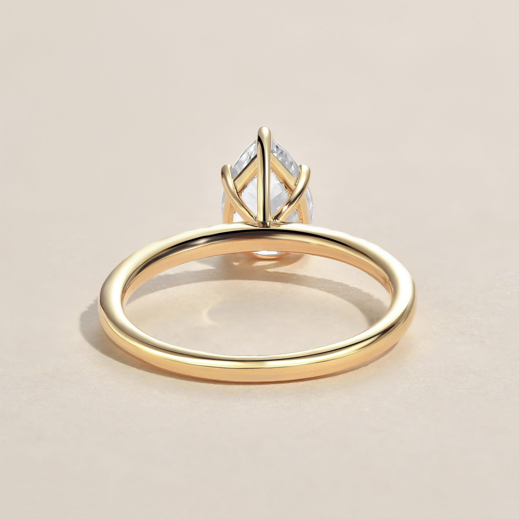 1.25 CT Pear Cut Solitaire Moissanite Engagement Ring - crownmoissanite