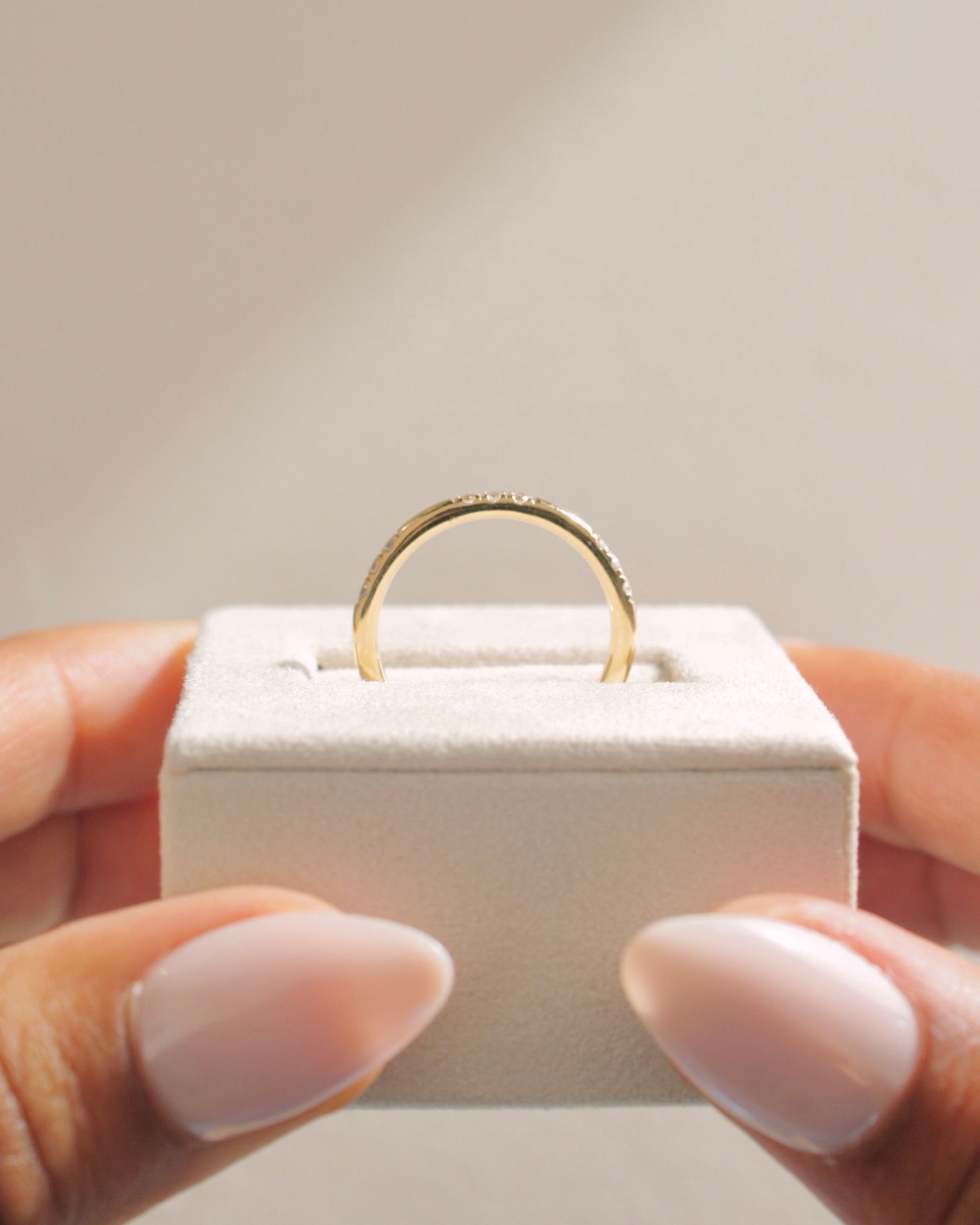 0.31 TCW round cut moissanite wedding band in a clustered pavé setting – delicate and sparkling gold band, perfect for bridal stacking or everyday elegance.