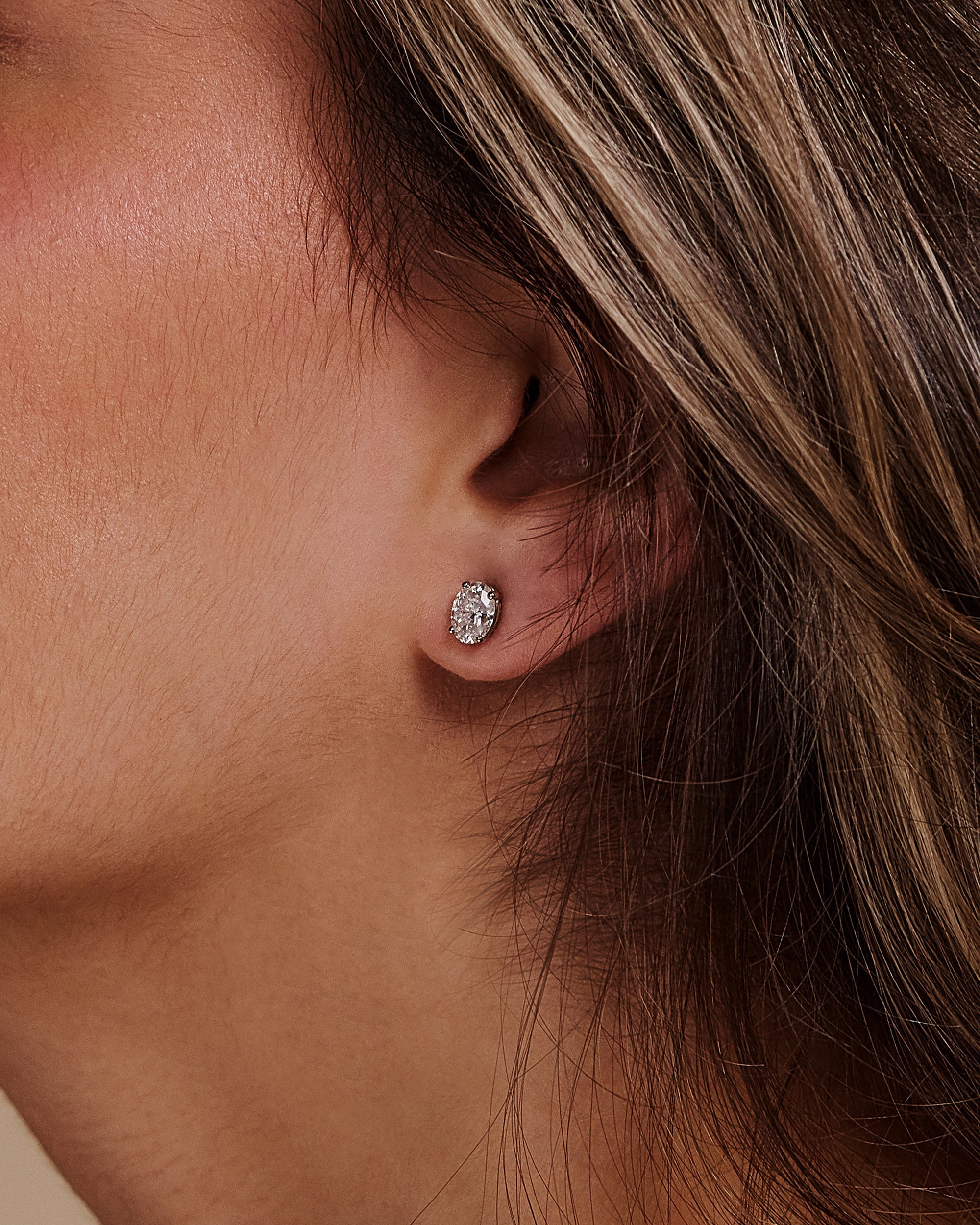 2.50 TCW oval cut moissanite stud earrings – elegant and timeless gold studs featuring brilliant oval stones, perfect for bridal sparkle or everyday sophistication.