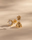 2.00 CT round cut moissanite earrings in a six-prong setting – timeless gold studs with enhanced brilliance and secure fit, perfect for bridal or everyday elegance.