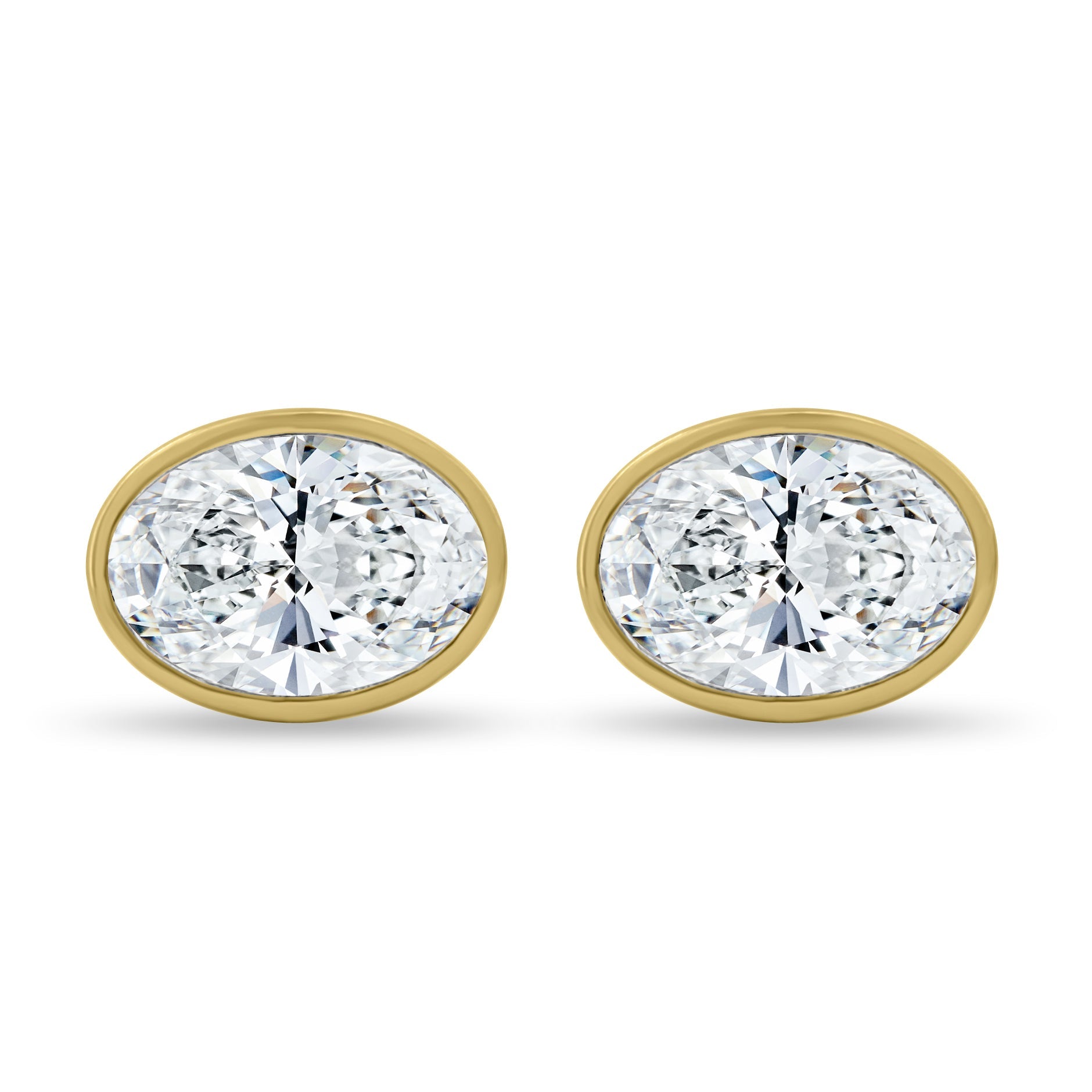 1.00 CT oval cut moissanite bezel set earrings – sleek and elegant gold studs with a modern, secure setting, perfect for everyday wear or special occasions.