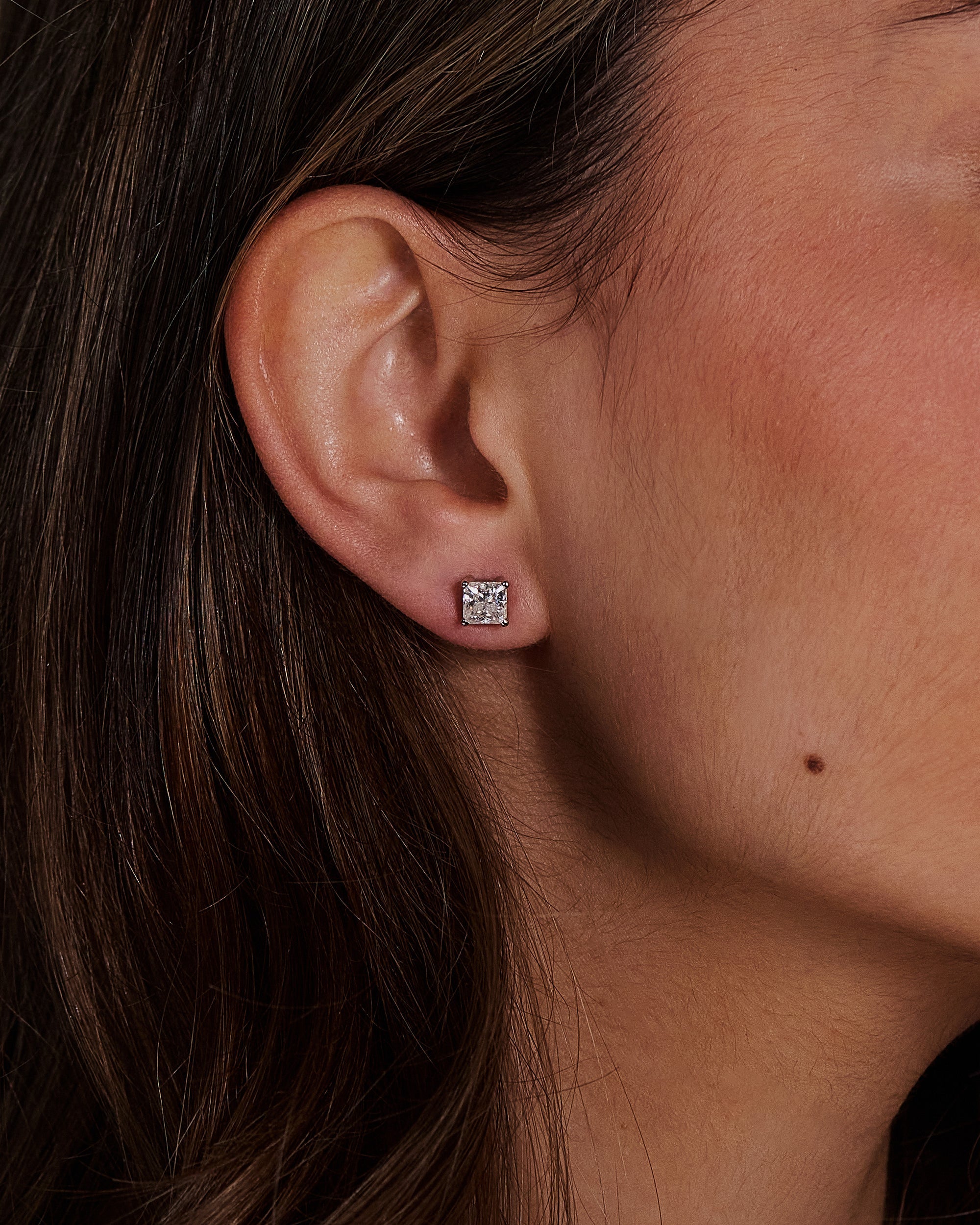 2.00 CT princess cut moissanite earrings in a four-prong setting – sleek and modern gold studs offering brilliant sparkle, perfect for elegant bridal or everyday wear