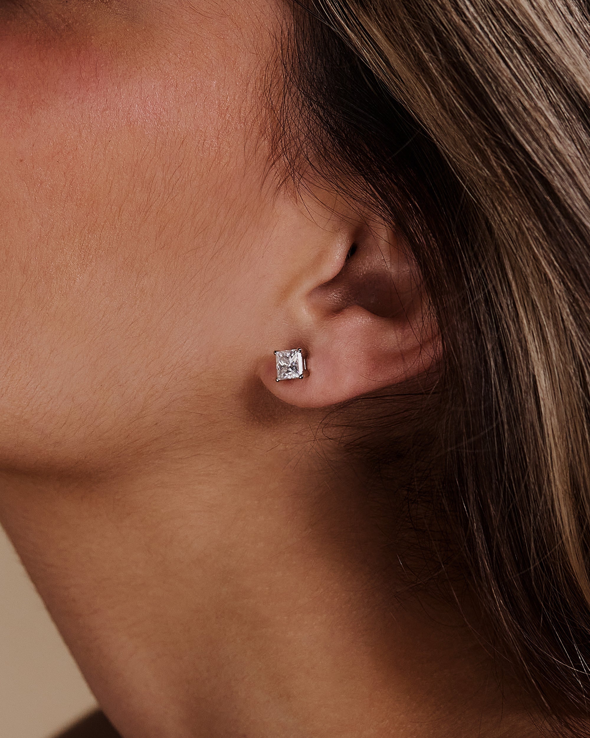 2.00 CT princess cut moissanite earrings in a four-prong setting – sleek and modern gold studs offering brilliant sparkle, perfect for elegant bridal or everyday wear