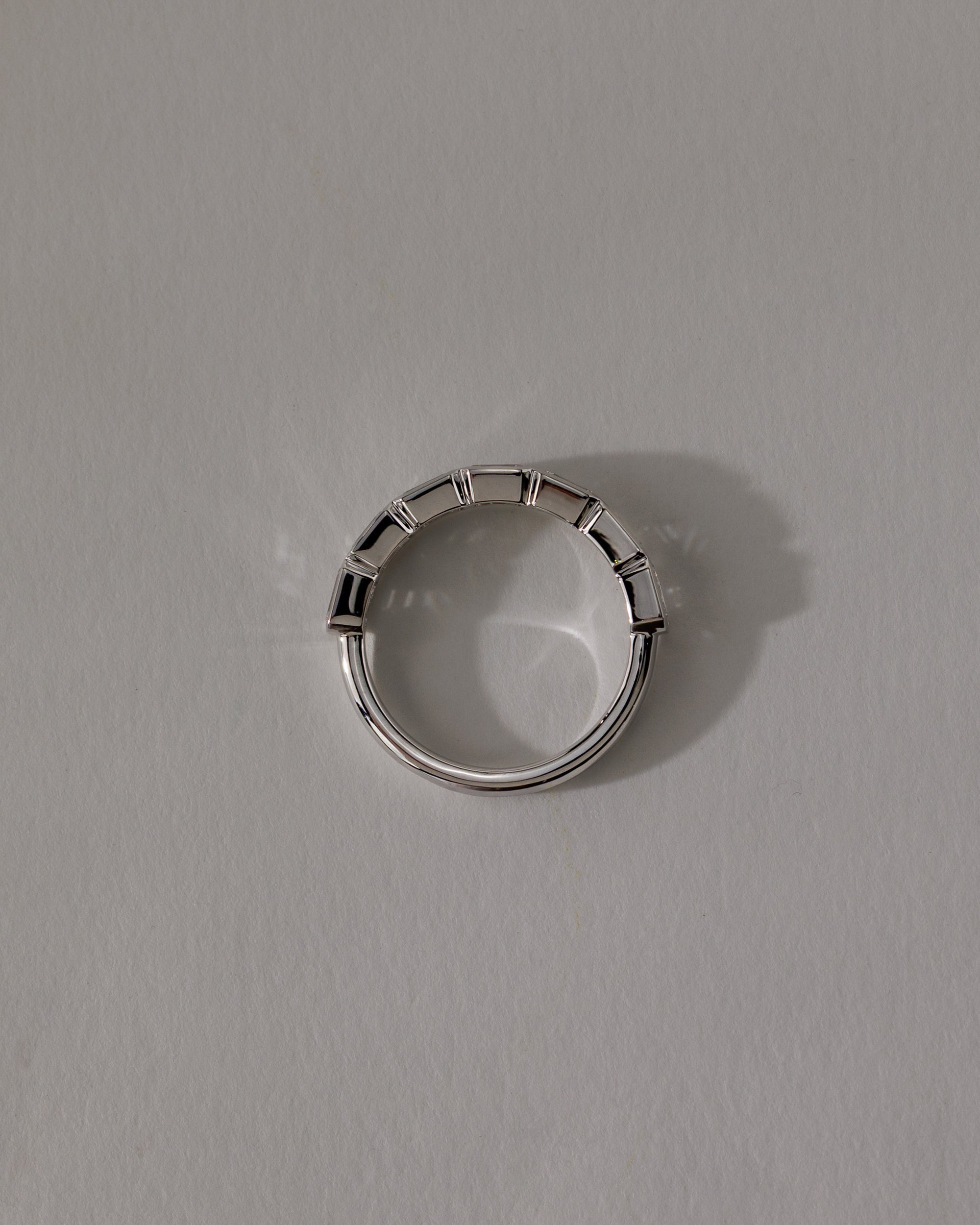 1.05 TCW emerald cut moissanite wedding band with bezel setting – sleek and sophisticated gold ring featuring step-cut stones, perfect for modern bridal or stacking style.