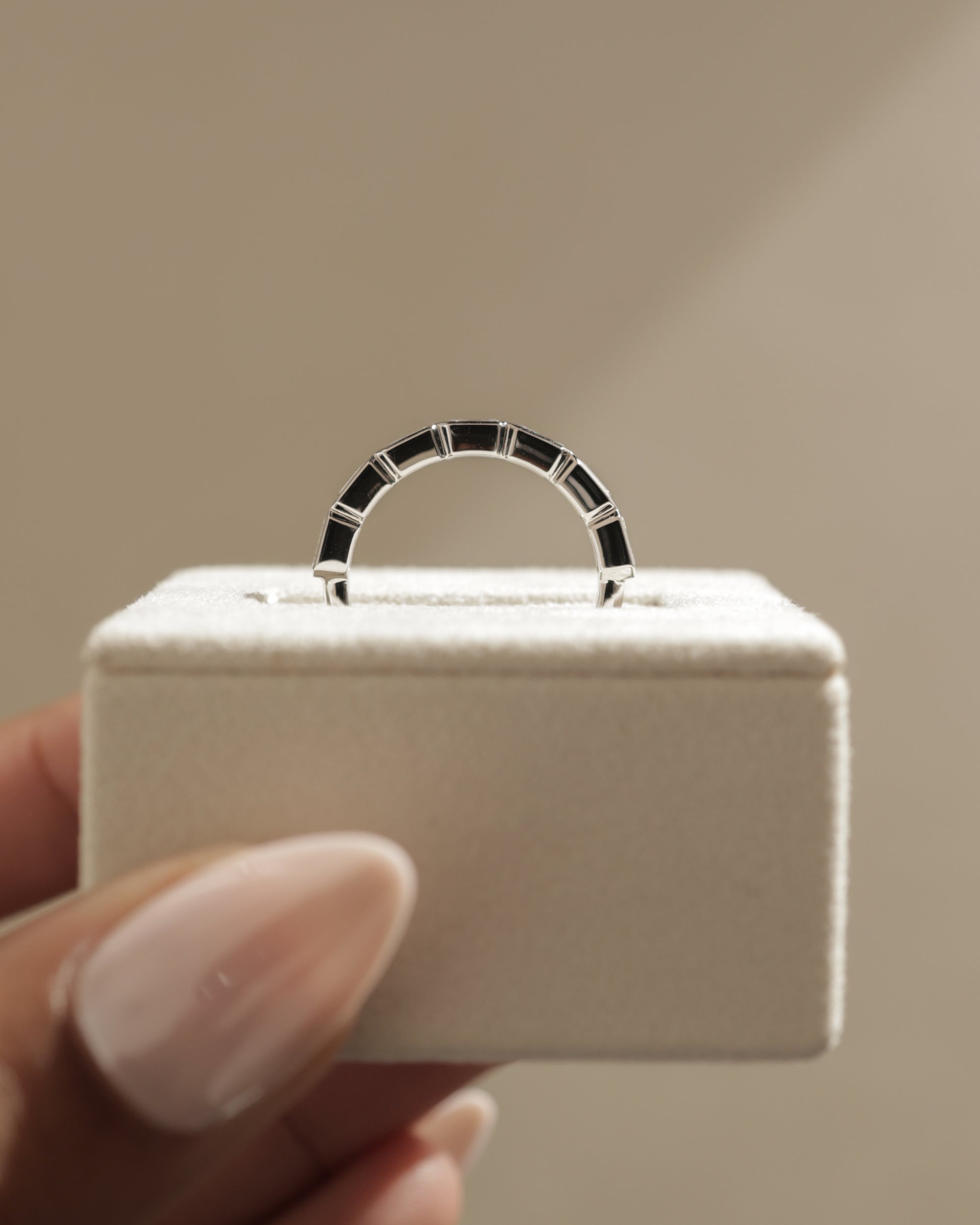 1.05 TCW emerald cut moissanite wedding band with bezel setting – sleek and sophisticated gold ring featuring step-cut stones, perfect for modern bridal or stacking style.