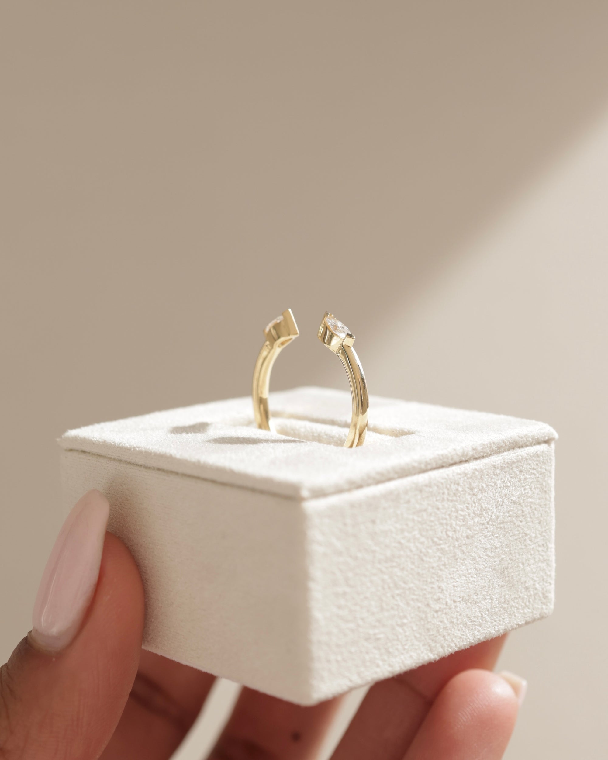 0.3 TCW marquise cut moissanite open-style wedding band – sleek and modern design crafted in polished gold, ideal for stacking or matching with engagement rings.