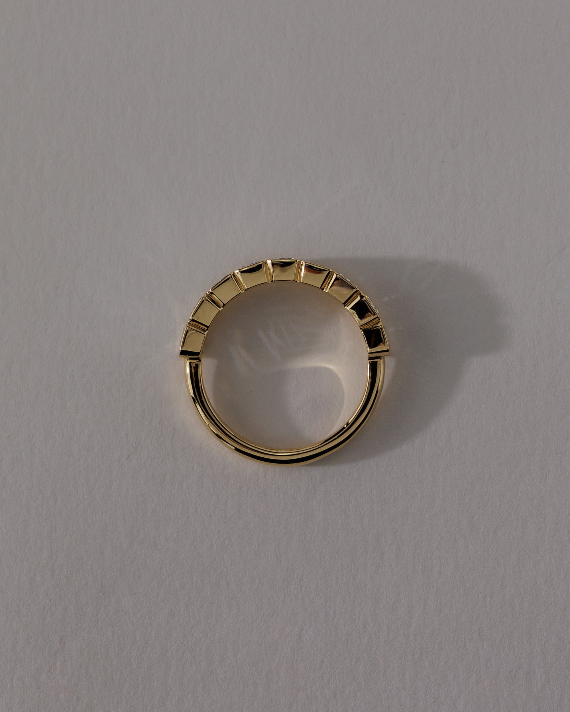 2.25 TCW emerald cut moissanite wedding band with bezel setting – modern and secure gold band featuring step-cut stones, perfect for bold bridal or statement wear.