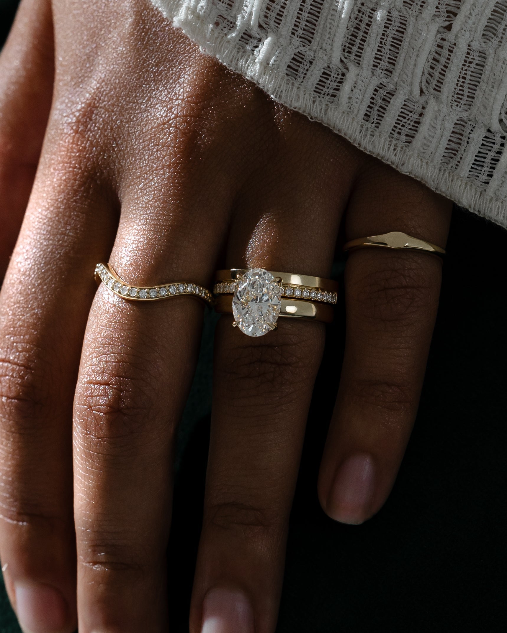 0.21 TCW round cut moissanite pavé wedding band in a bold cigar-style design – wide gold band with delicate sparkle, perfect for modern bridal or statement wear.