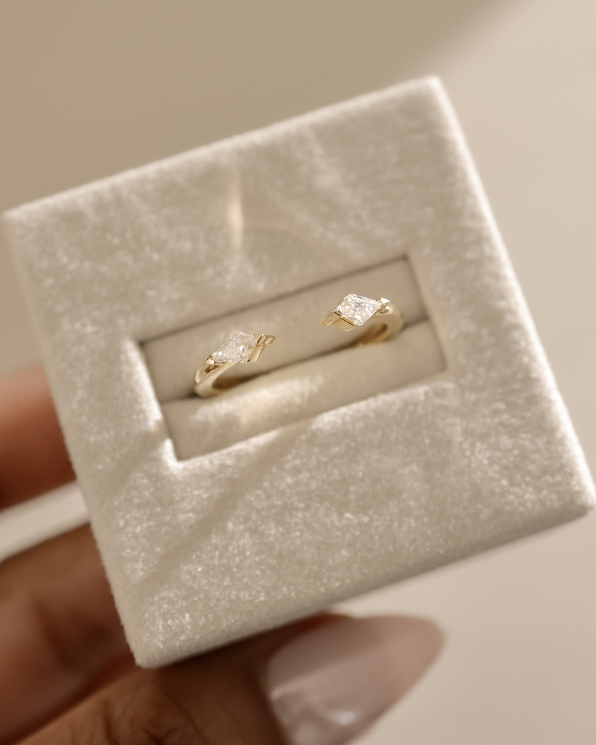 0.4 TCW kite cut moissanite open-style wedding band – contemporary and edgy design in polished gold, perfect for stacking or pairing with statement engagement rings.