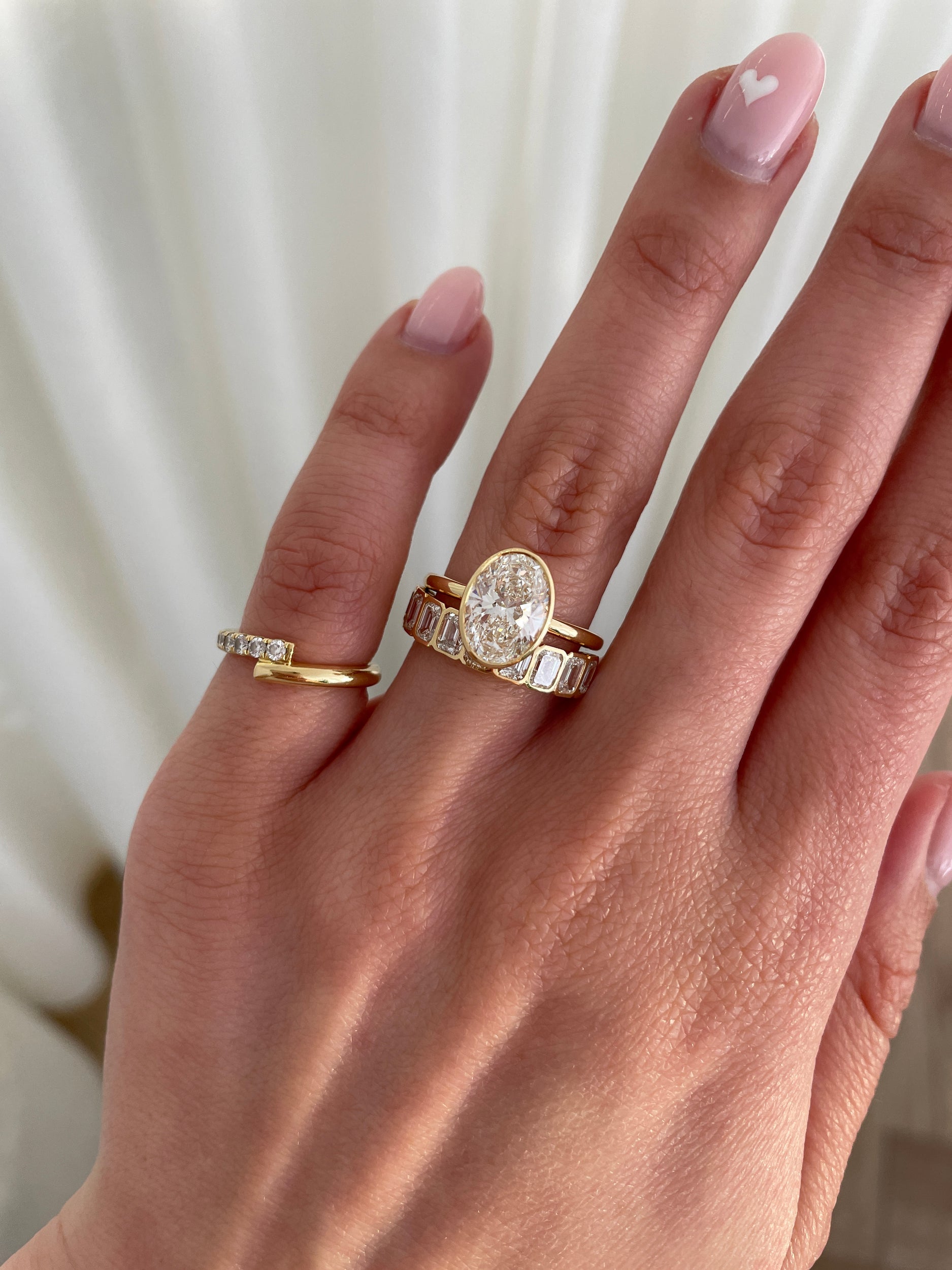 2.25 TCW emerald cut moissanite wedding band with bezel setting – modern and secure gold band featuring step-cut stones, perfect for bold bridal or statement wear.