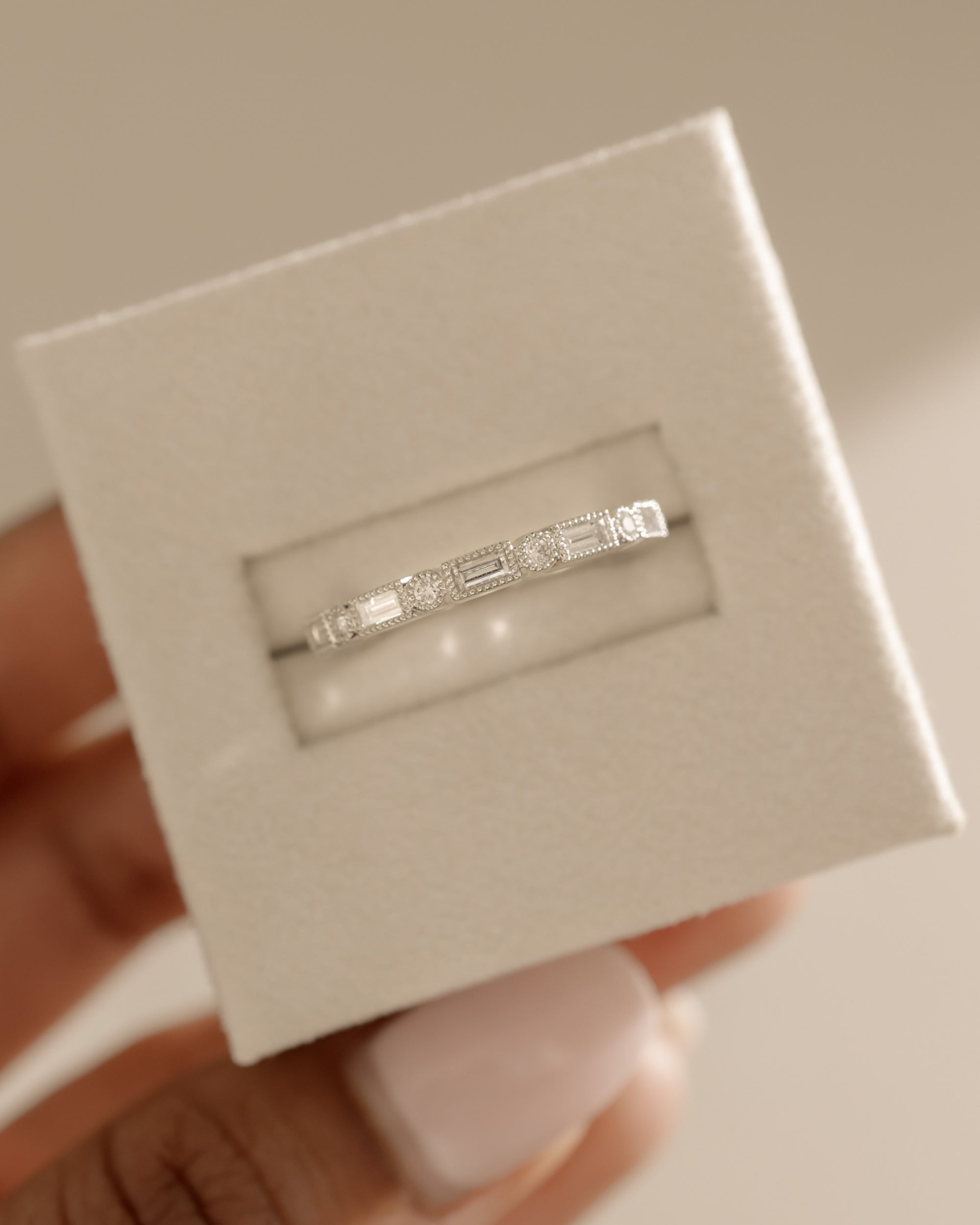 0.40 TCW round and emerald cut moissanite wedding band with vintage-inspired milgrain detailing – elegant gold ring combining classic charm with timeless sparkle.