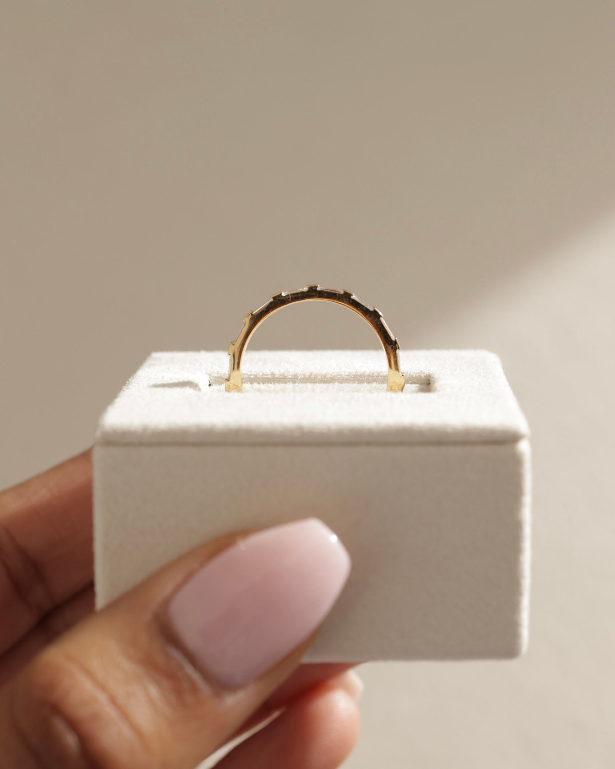 0.32 TCW baguette cut moissanite half eternity wedding band – sleek and modern gold ring featuring step-cut stones, perfect for stacking or contemporary bridal wear.