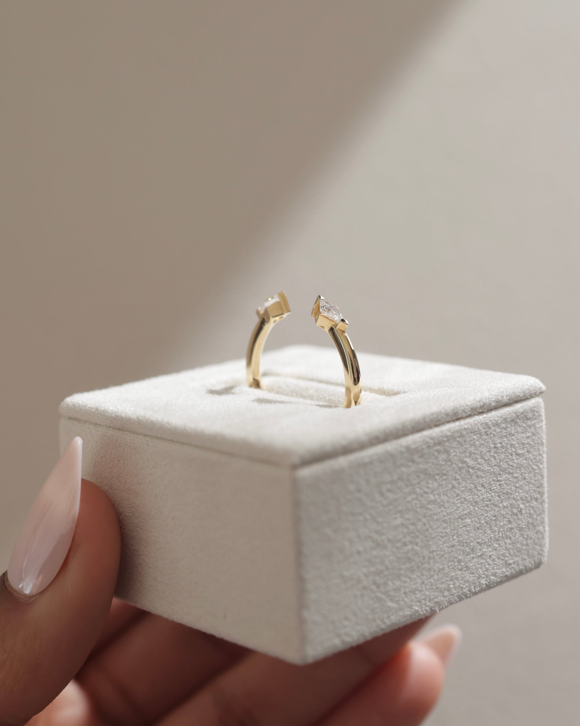 0.4 TCW kite cut moissanite open-style wedding band – contemporary and edgy design in polished gold, perfect for stacking or pairing with statement engagement rings.