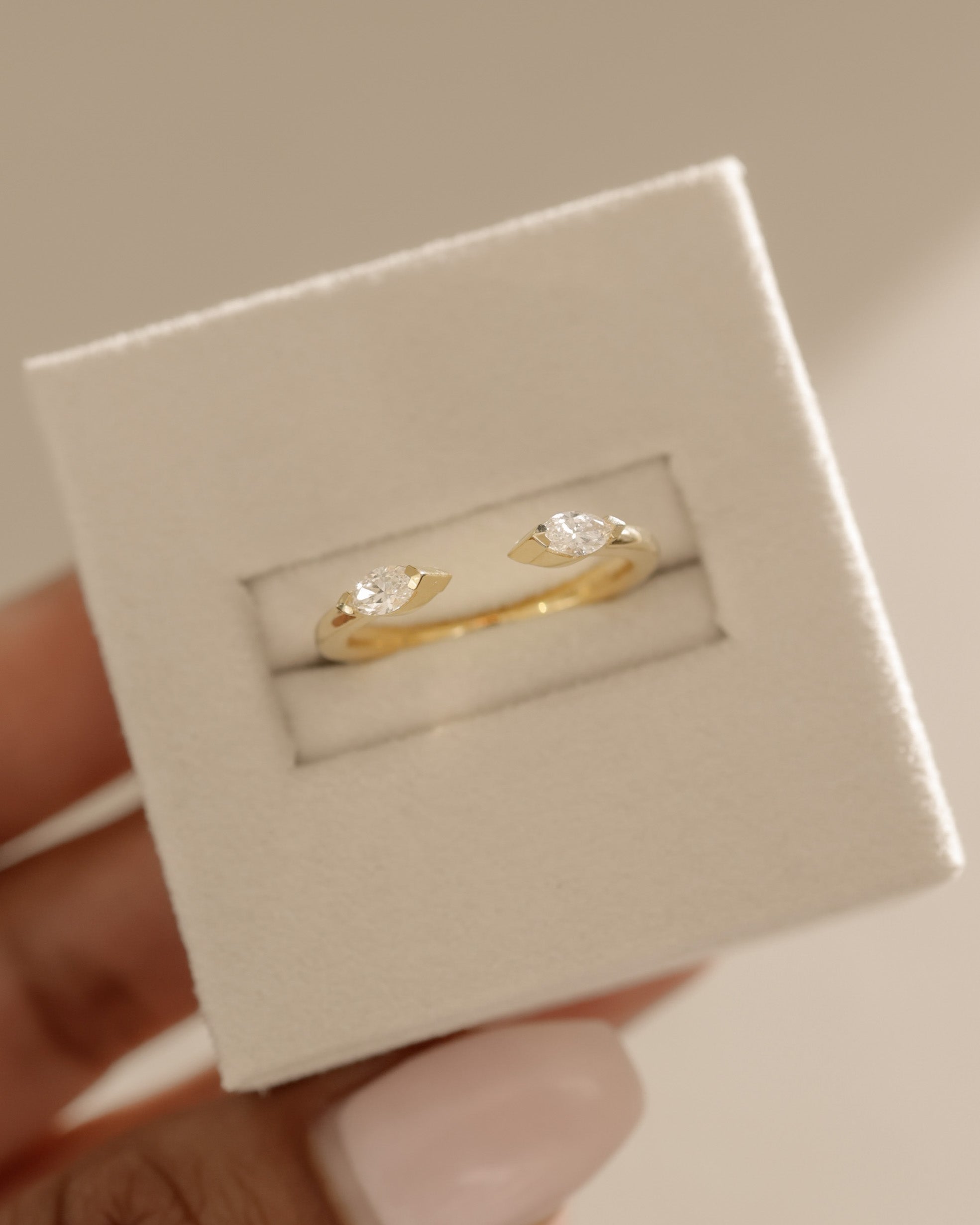 0.3 TCW marquise cut moissanite open-style wedding band – sleek and modern design crafted in polished gold, ideal for stacking or matching with engagement rings.