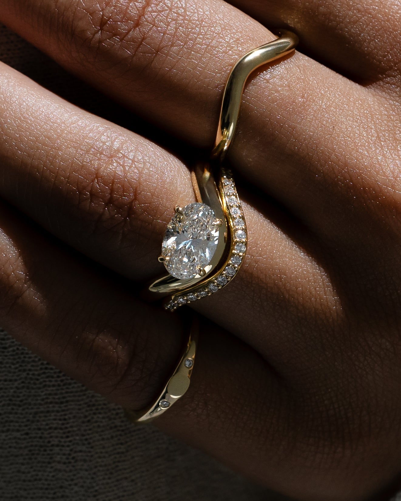 0.26 TCW round moissanite half eternity wedding band in a wavy design – elegant bridal ring in polished gold, perfect for stacking or wearing solo.