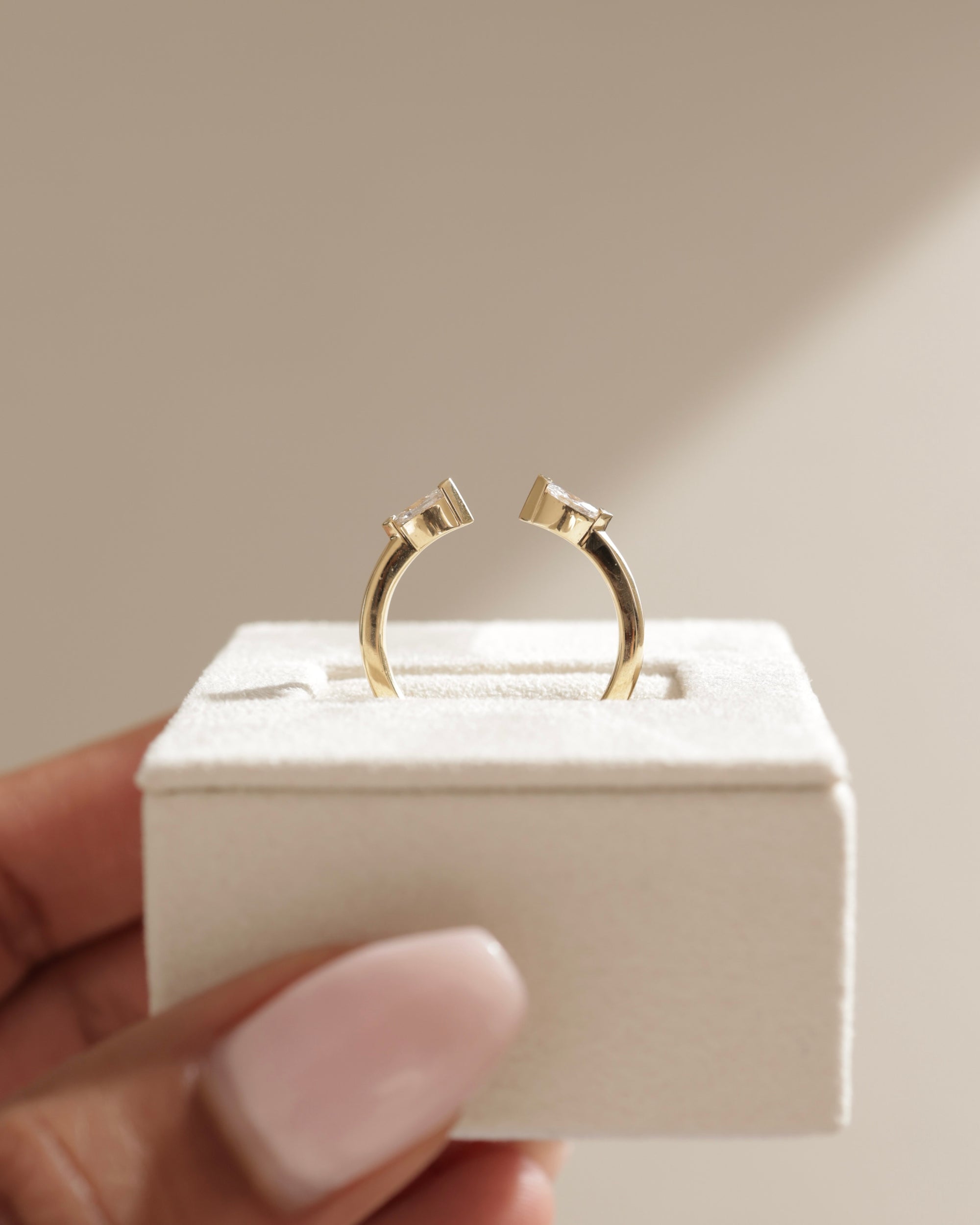 0.3 TCW marquise cut moissanite open-style wedding band – sleek and modern design crafted in polished gold, ideal for stacking or matching with engagement rings.