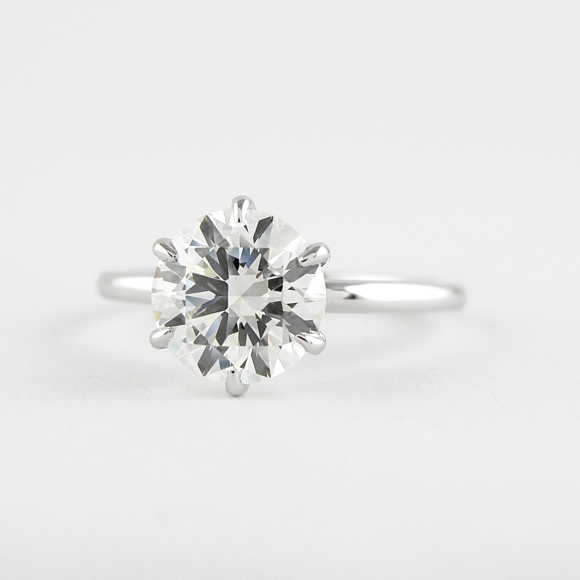 1.0 CT Round Solitaire Style Moissanite Engagement Ring - crownmoissanite
