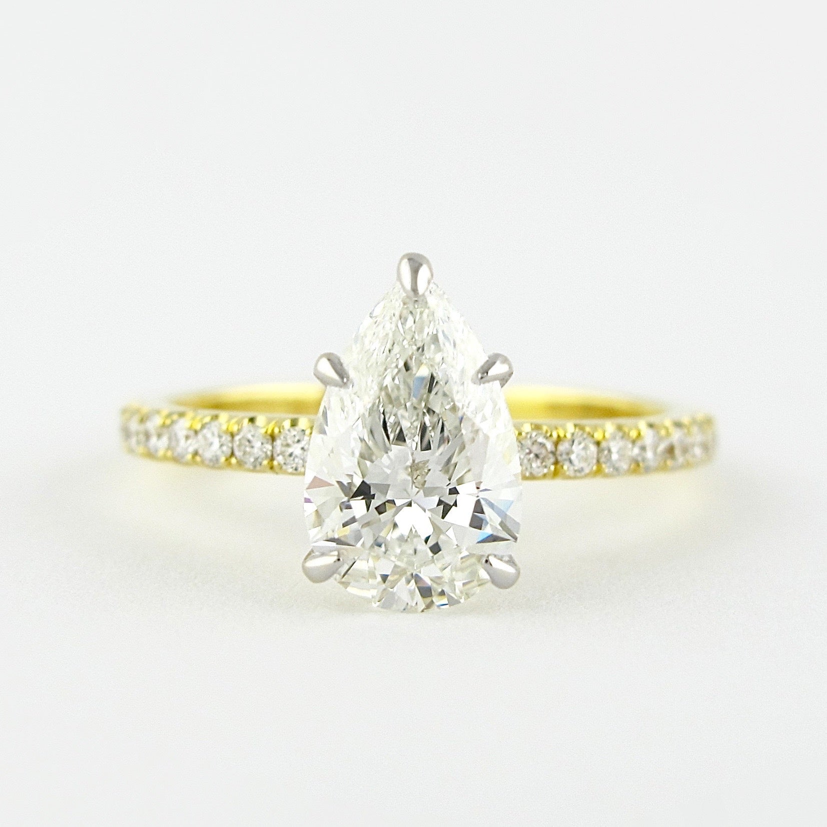 0.94 CT Pear Solitaire & Pave Setting Moissanite Engagement Ring - crownmoissanite
