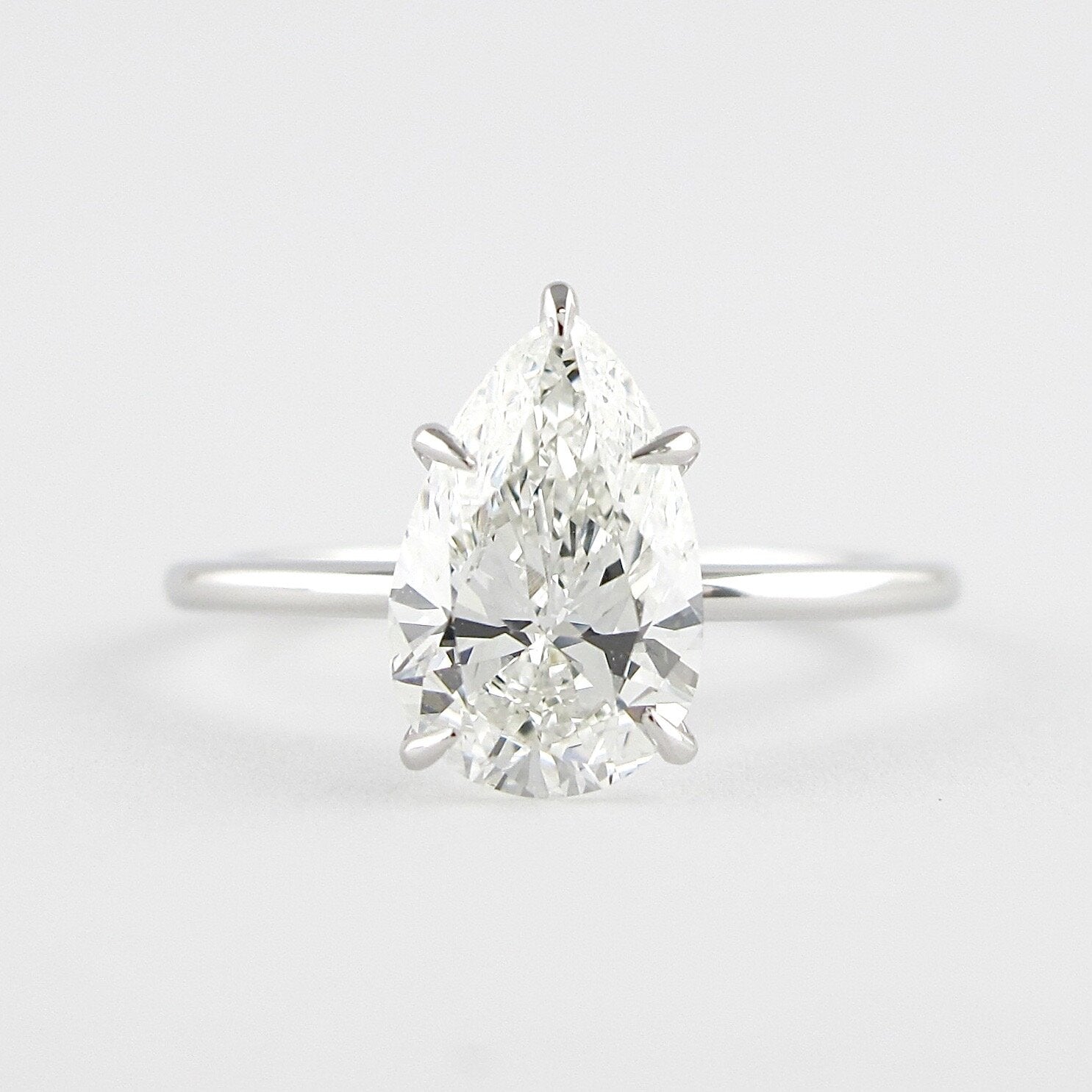 1.5 CT Pear Shaped Moissanite Solitaire Engagement Ring - crownmoissanite