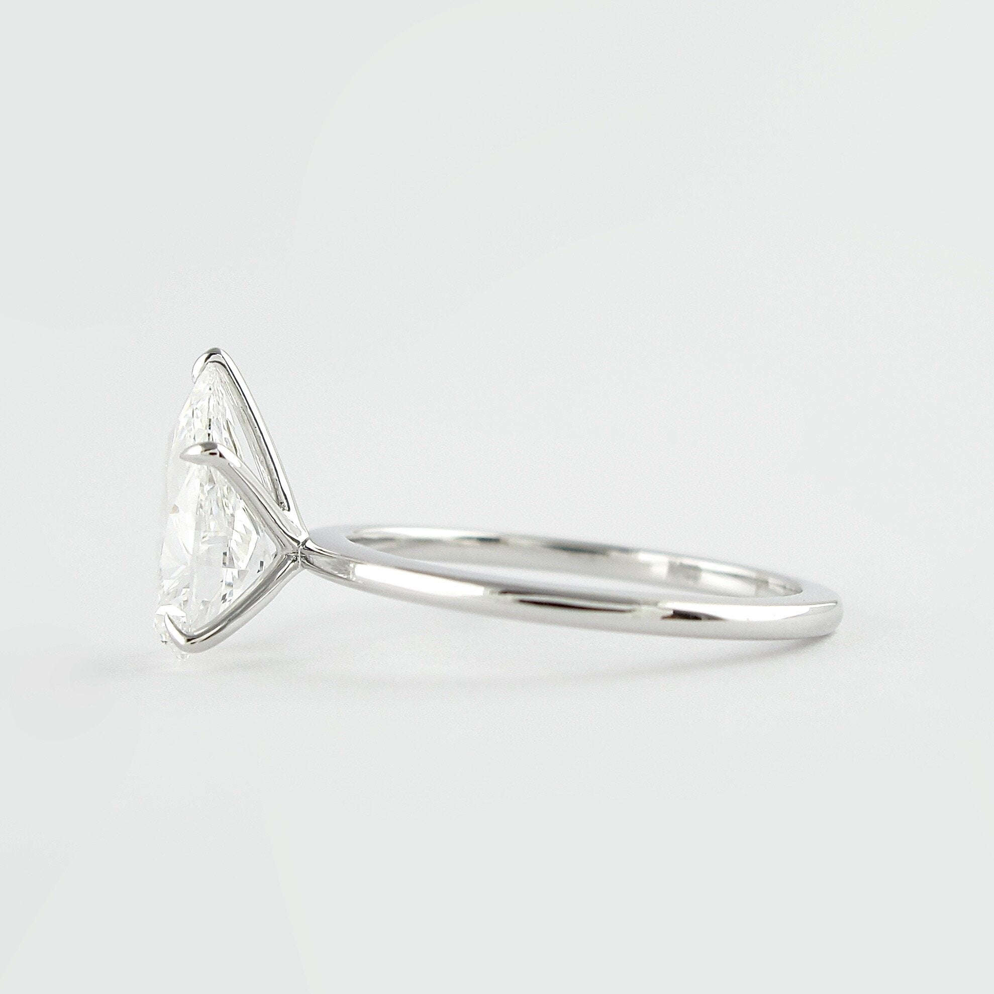 1.5 CT Pear Shaped Moissanite Solitaire Engagement Ring - crownmoissanite