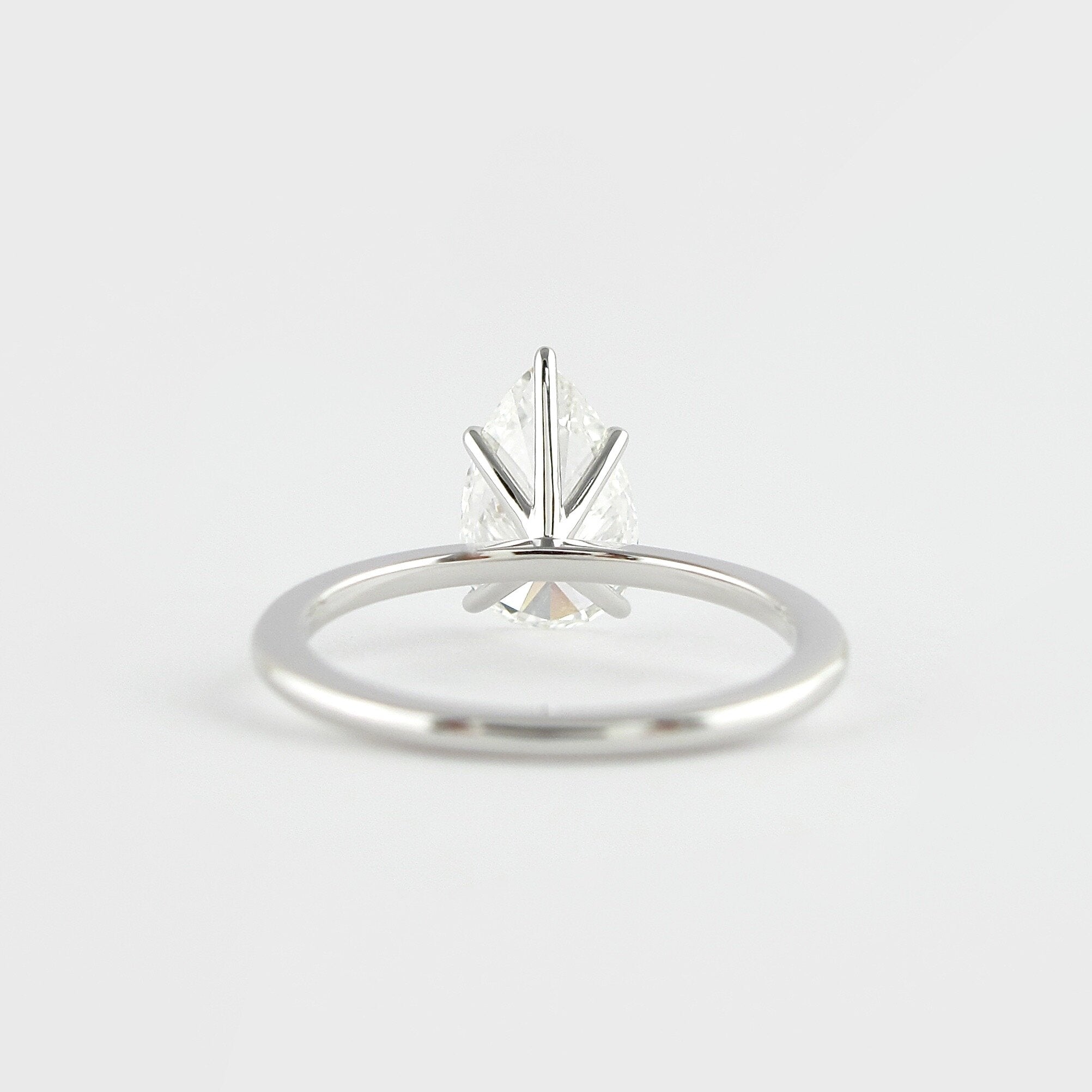 1.5 CT Pear Cut Solitaire Style Moissanite Engagement Ring - crownmoissanite