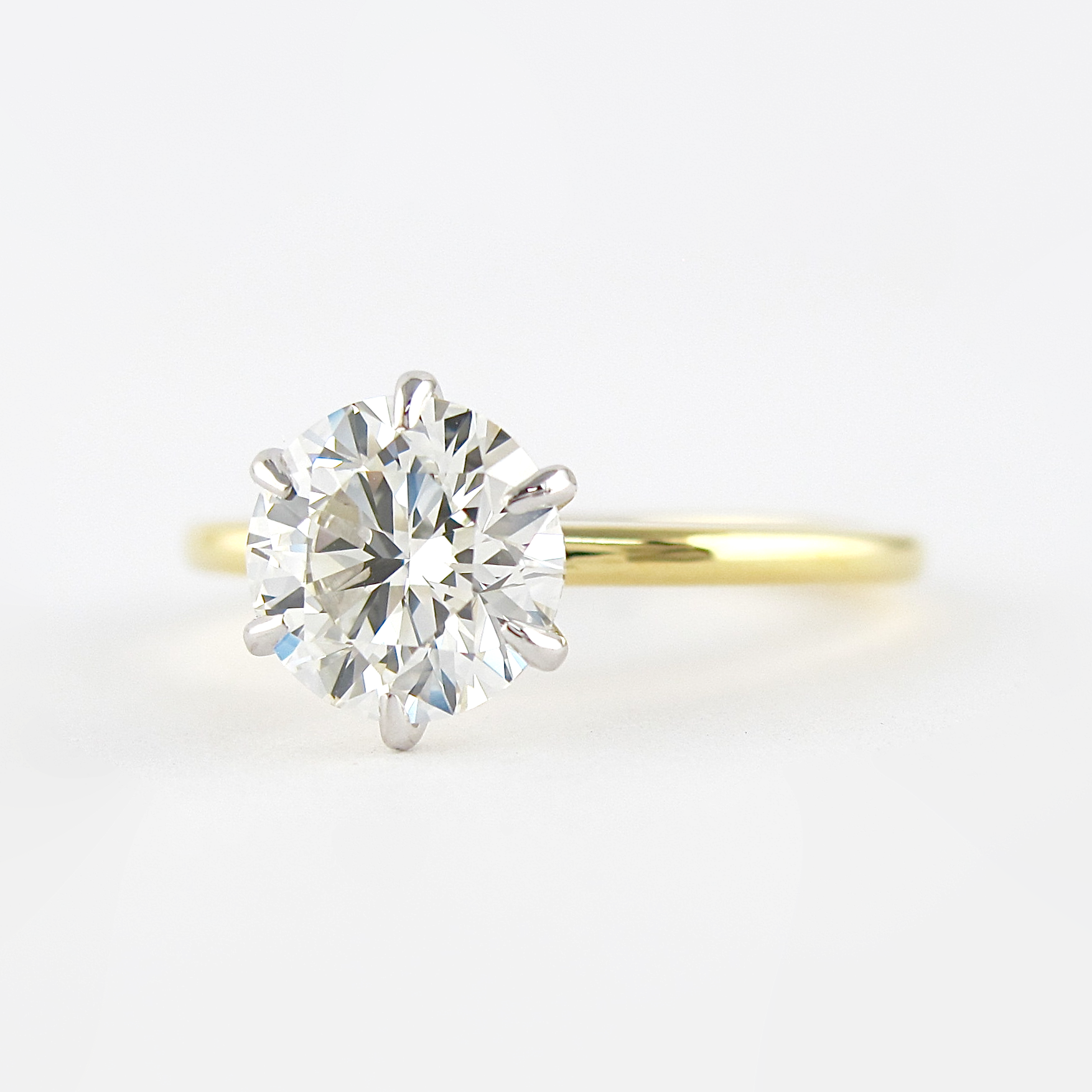 1.0 CT Round Cut Solitaire Style Moissanite Engagement Ring - crownmoissanite
