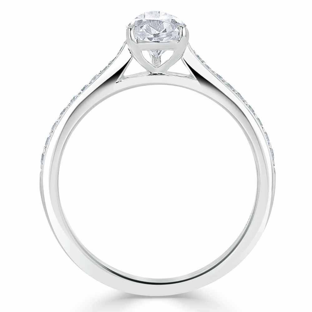 0.75 CT Pear Cut Solitaire Engagement Ring With Channel Pave Setting - crownmoissanite