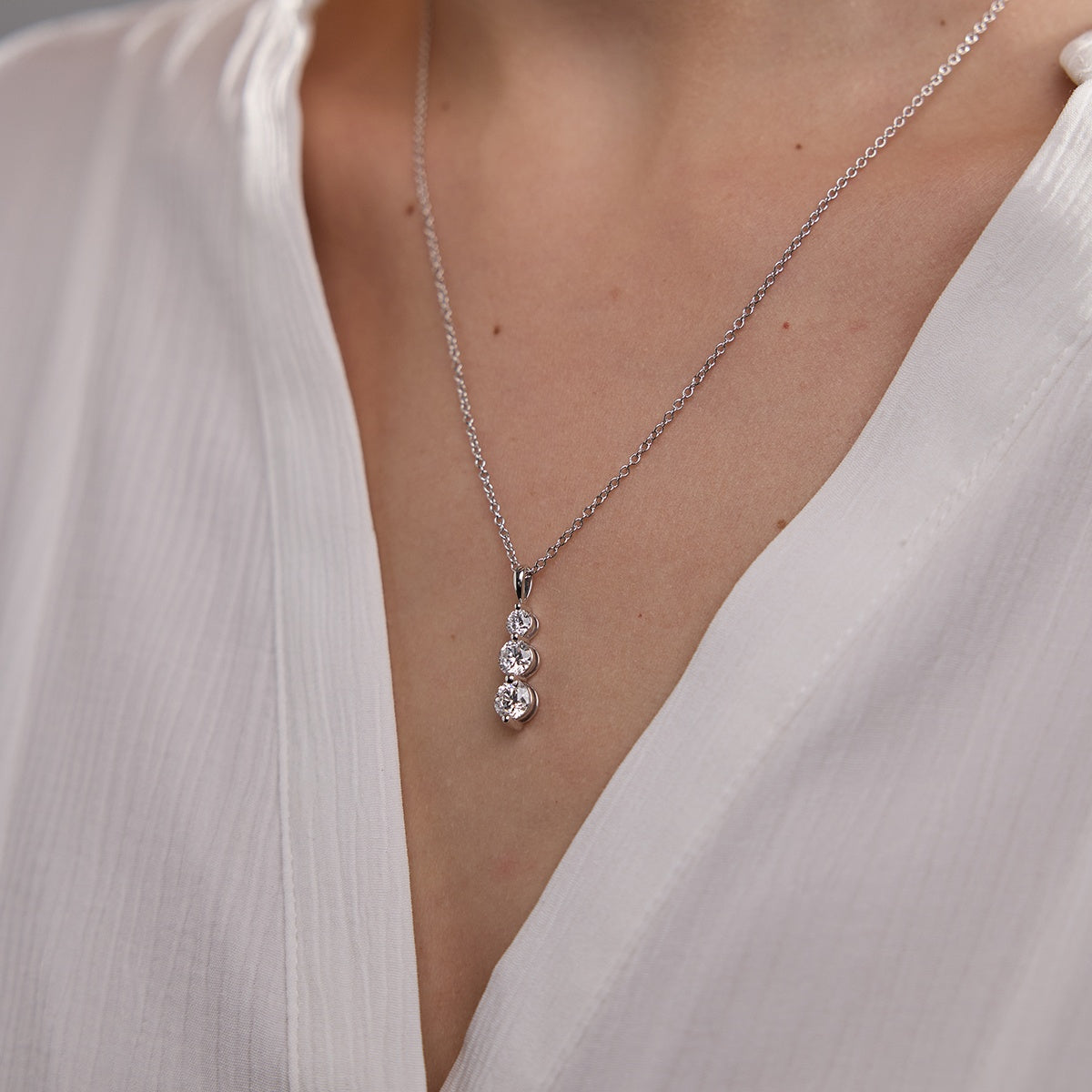 1.50 TCW Round Moissanite Diamond Three-Stone Drop Pendant Necklace - crownmoissanite