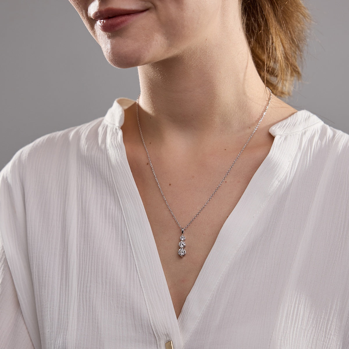 1.50 TCW Round Moissanite Diamond Three-Stone Drop Pendant Necklace - crownmoissanite