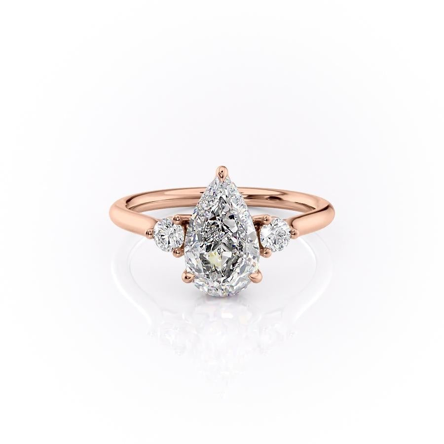 2.0 CT Pear Cut Three Stone Moissanite Engagement Ring - crownmoissanite