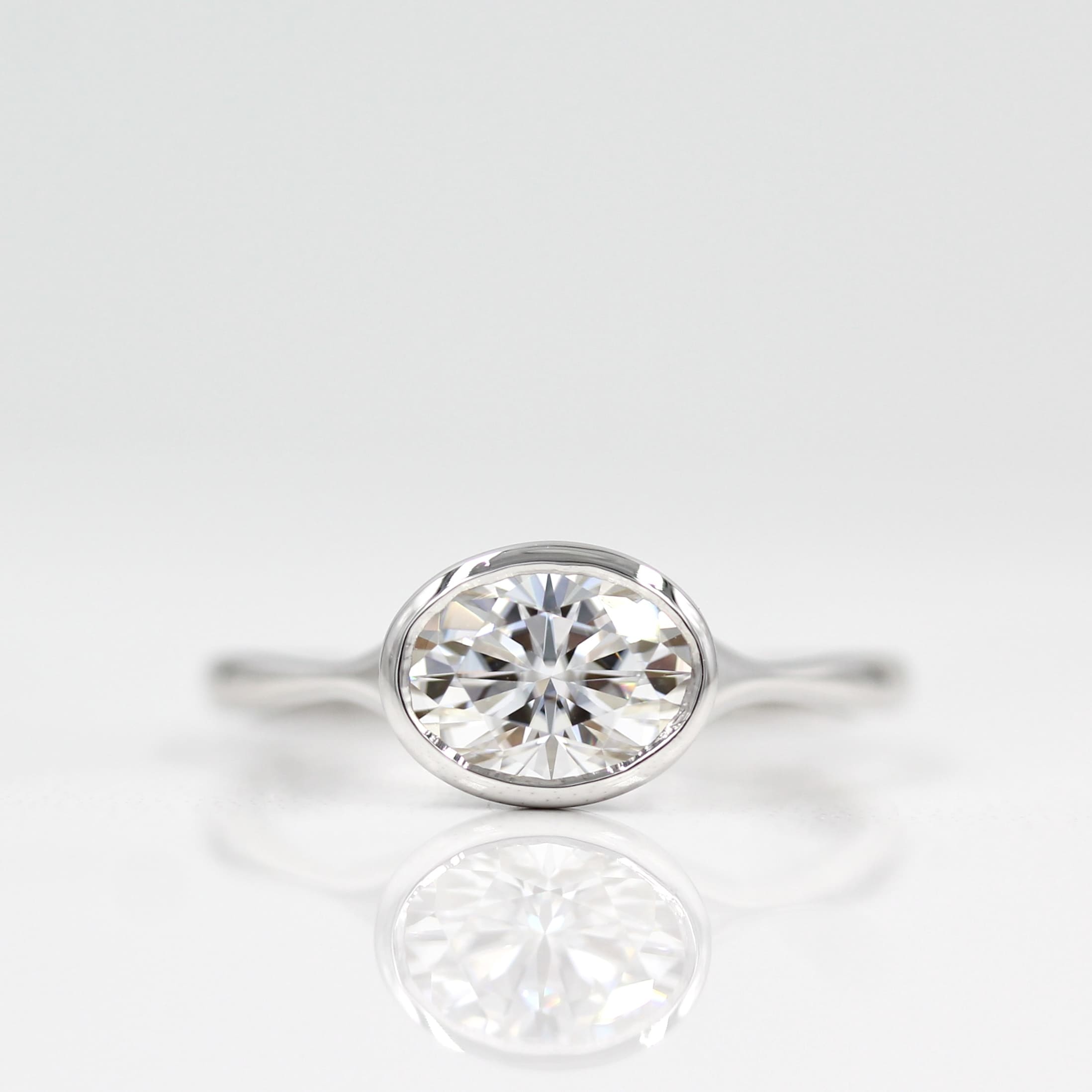 1.0 CT Oval Cut Bezel Solitaire Moissanite Engagement Ring - crownmoissanite