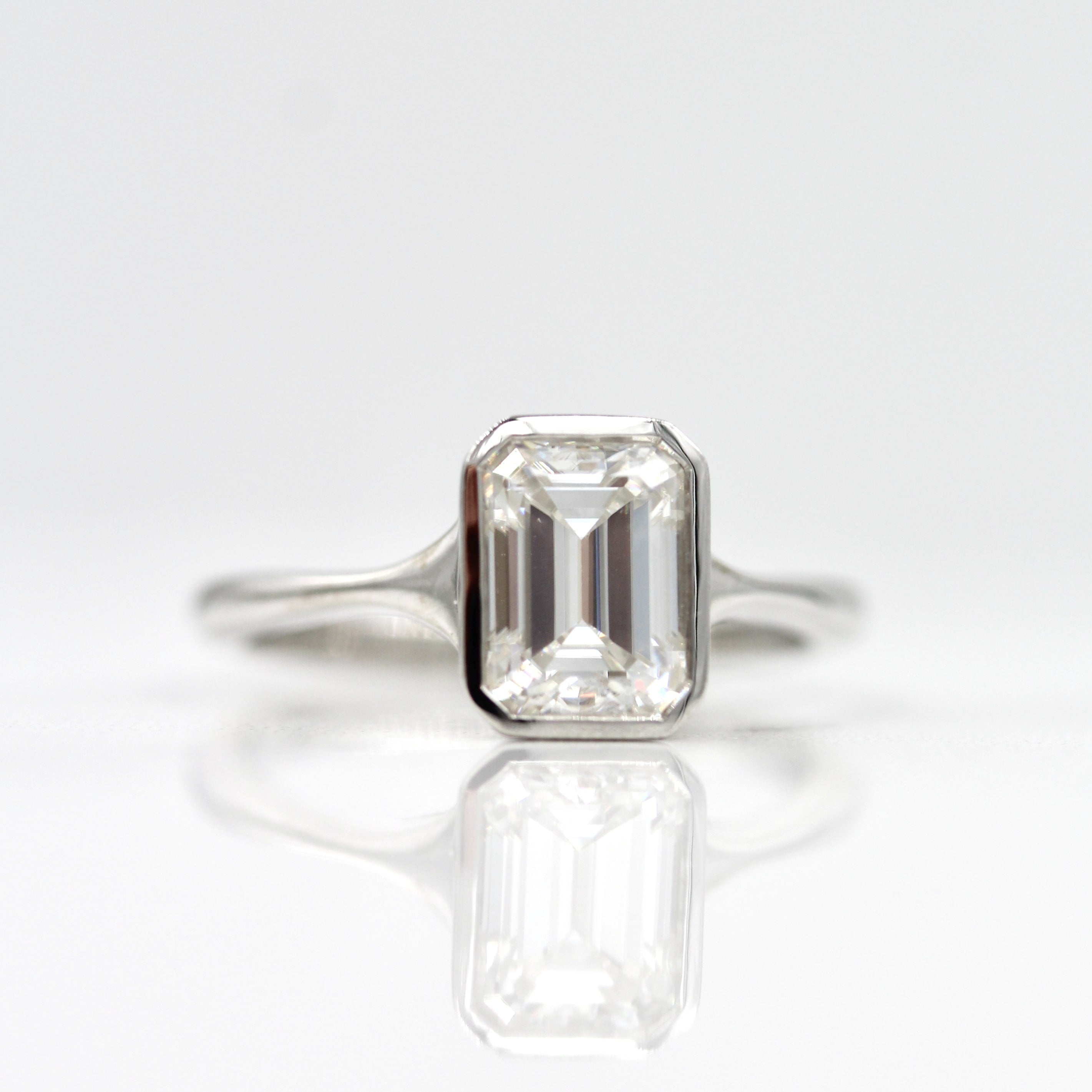 1.55 CT Emerald Cut Bezel Solitaire Moissanite Engagement Ring - crownmoissanite