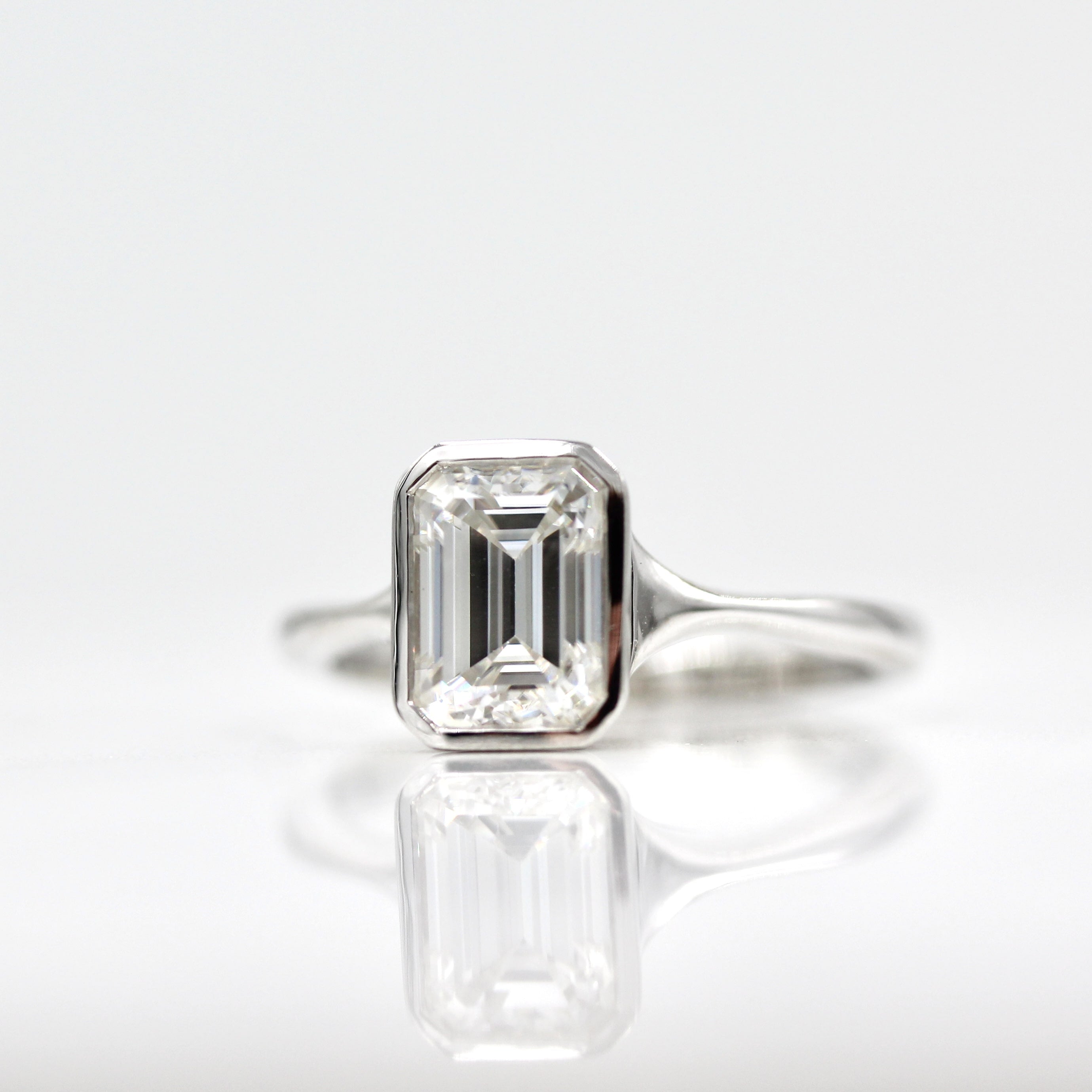 1.55 CT Emerald Shaped Moissanite Bezel Solitaire Engagement Ring - crownmoissanite