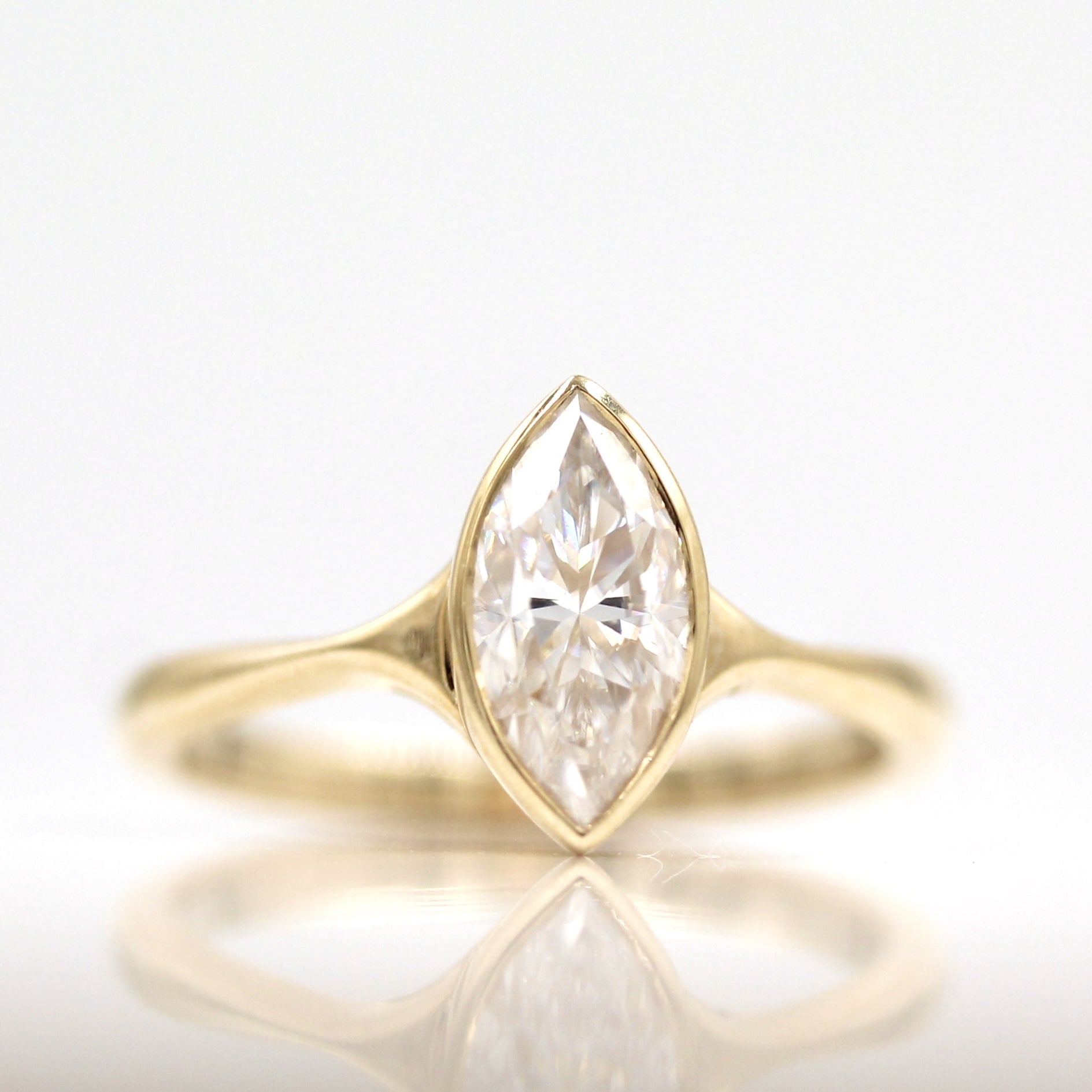 1.0 CT Marquise Shaped Moissanite Bezel Solitaire Engagement Ring - crownmoissanite
