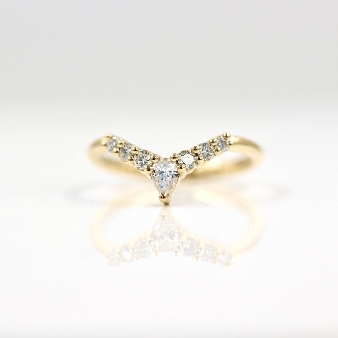 0.31 TCW Round & Pear Cut Curved Moissanite Wedding Band - crownmoissanite