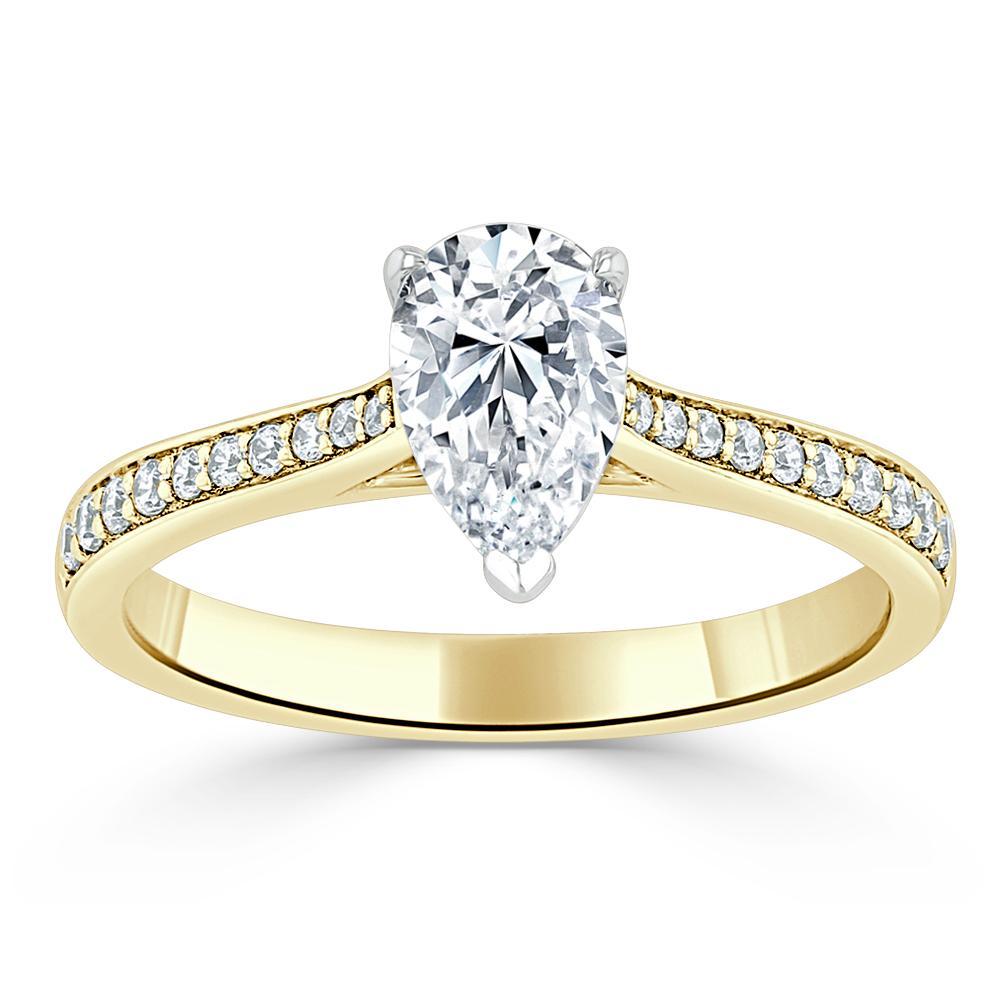 0.75 CT Pear Cut Solitaire Engagement Ring With Channel Pave Setting - crownmoissanite