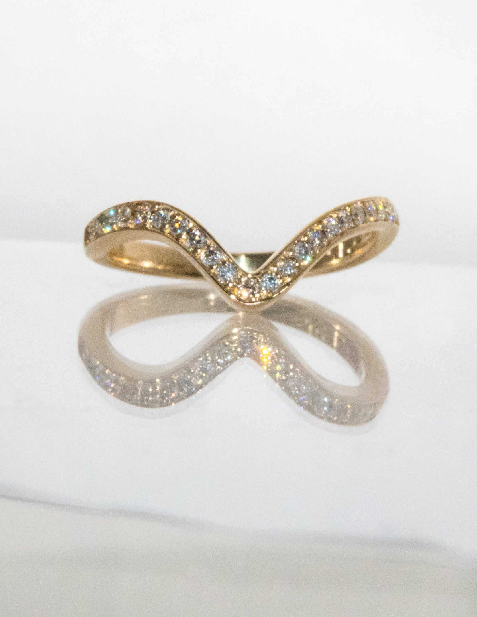 0.50 TCW Round Moissanite Curved Pave Wedding Band