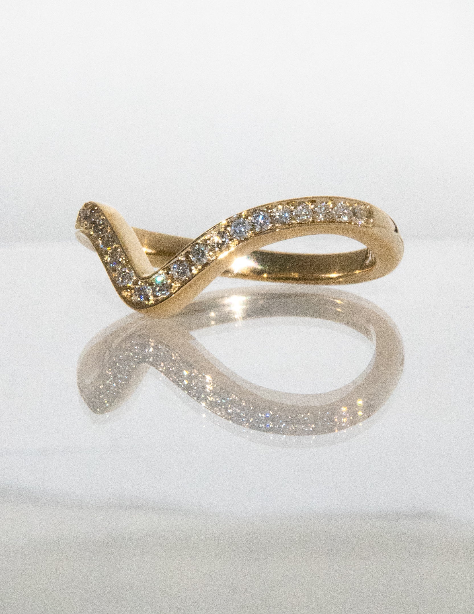 0.50 TCW Round Moissanite Curved Pave Wedding Band