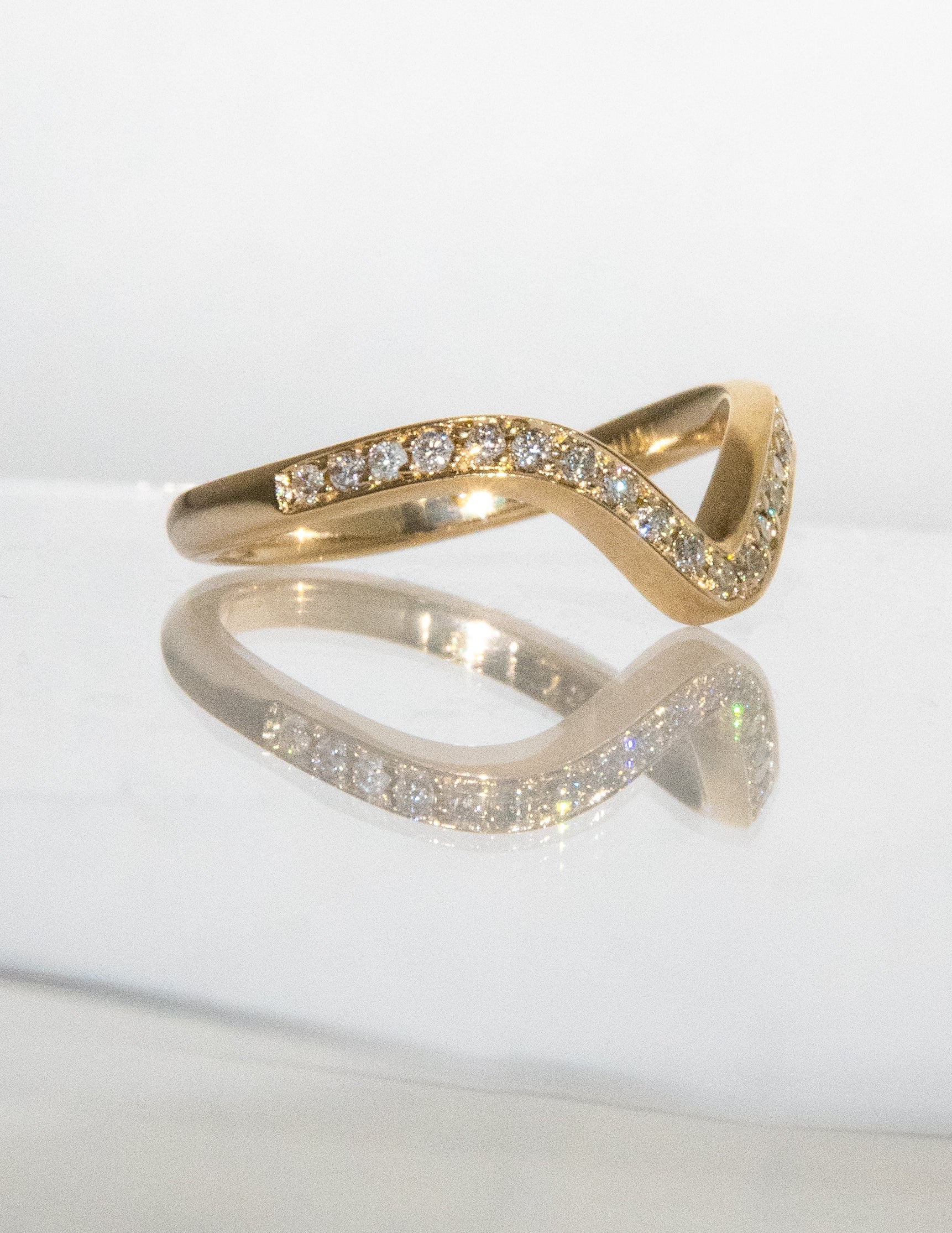 0.50 TCW Round Moissanite Curved Pave Wedding Band