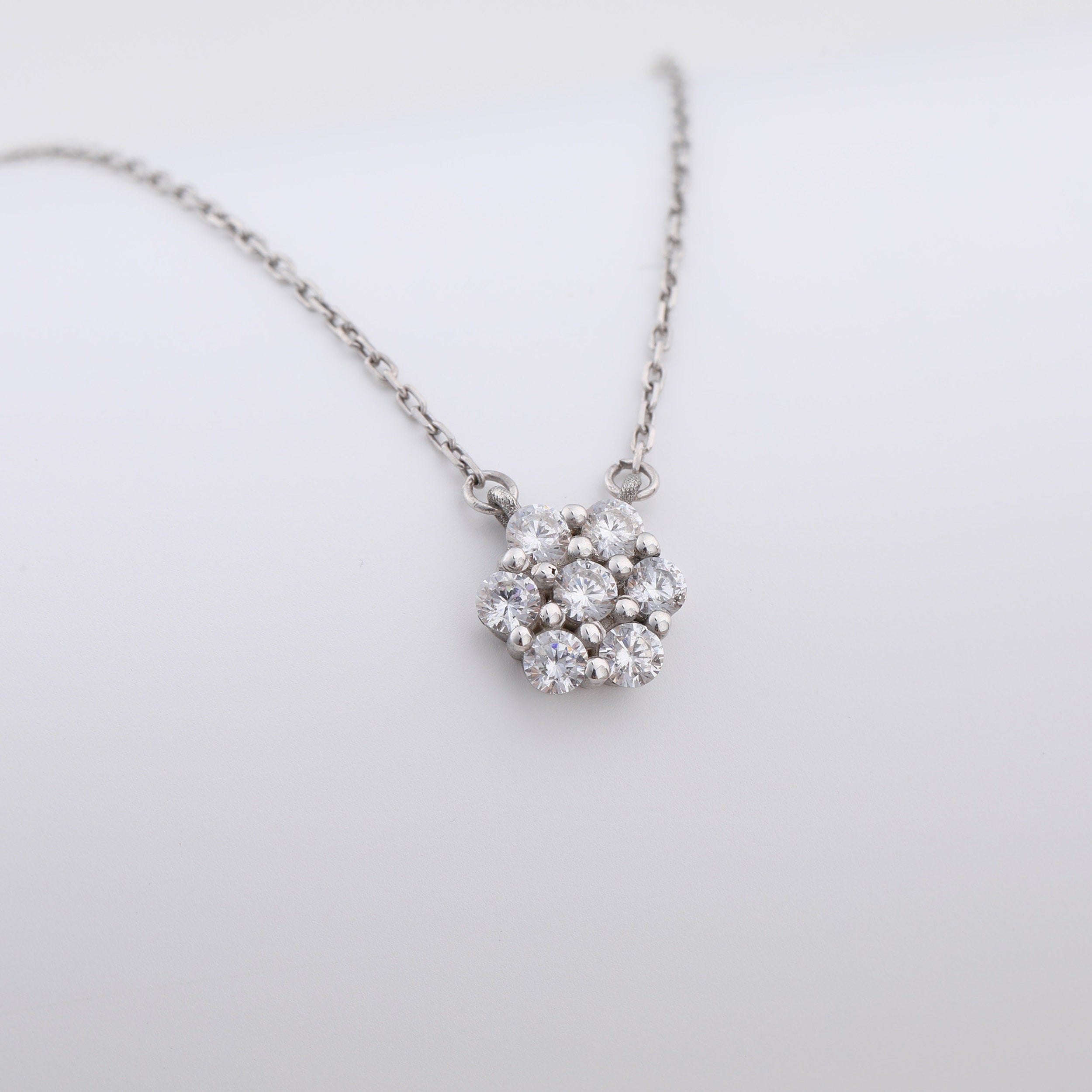 0.21 TCW Round Moissanite Flower Pendant Necklace - crownmoissanite