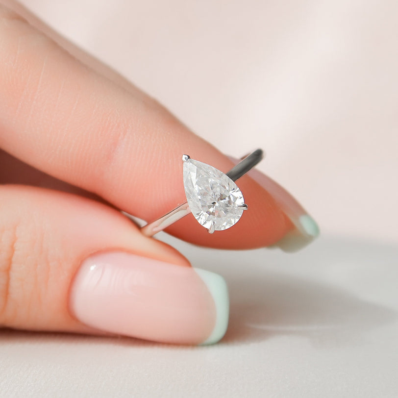 1.5 CT Pear Hidden Halo Moissanite Engagement Ring - crownmoissanite