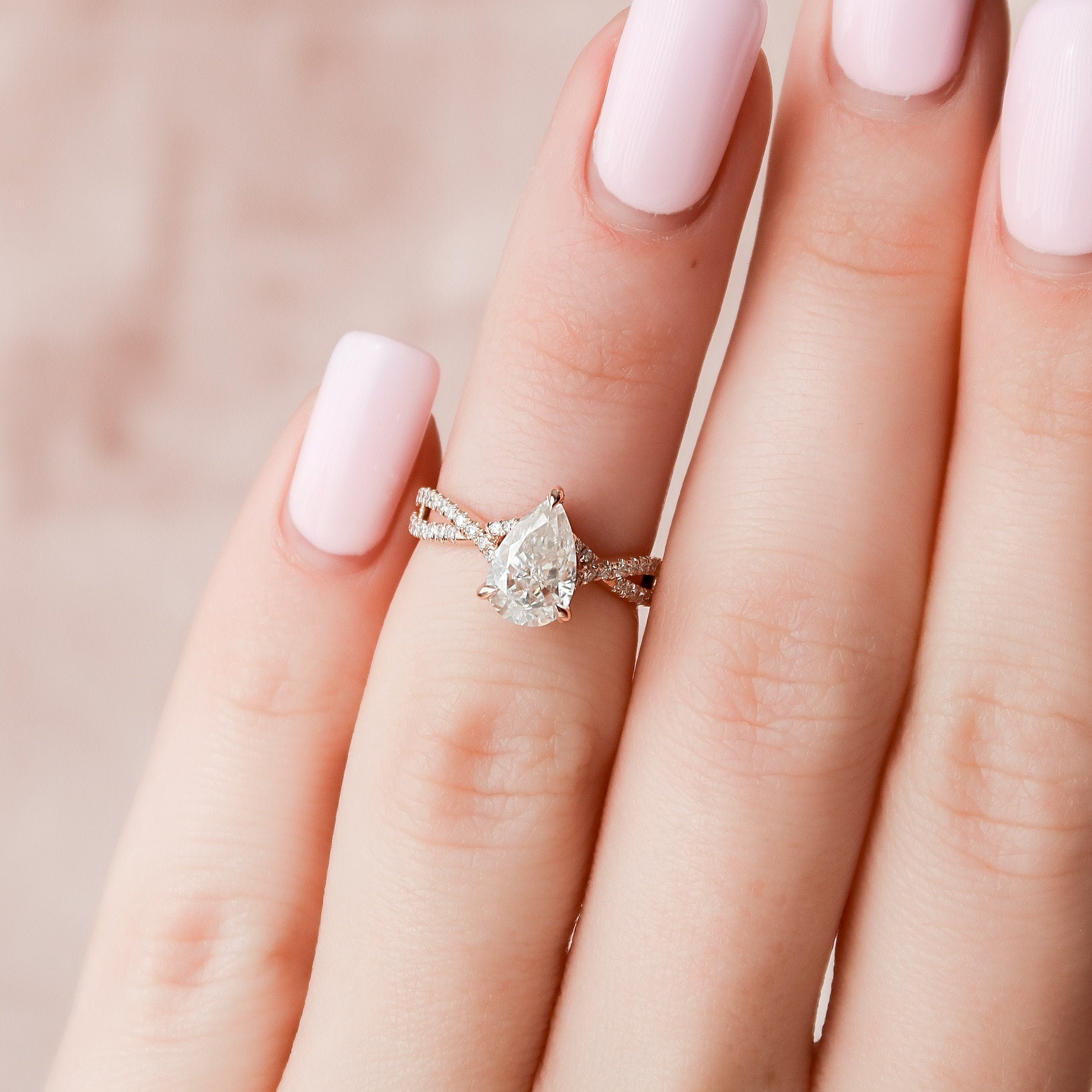 1.0 CT Pear Shaped Moissanite Twisted Pave Engagement Ring - crownmoissanite