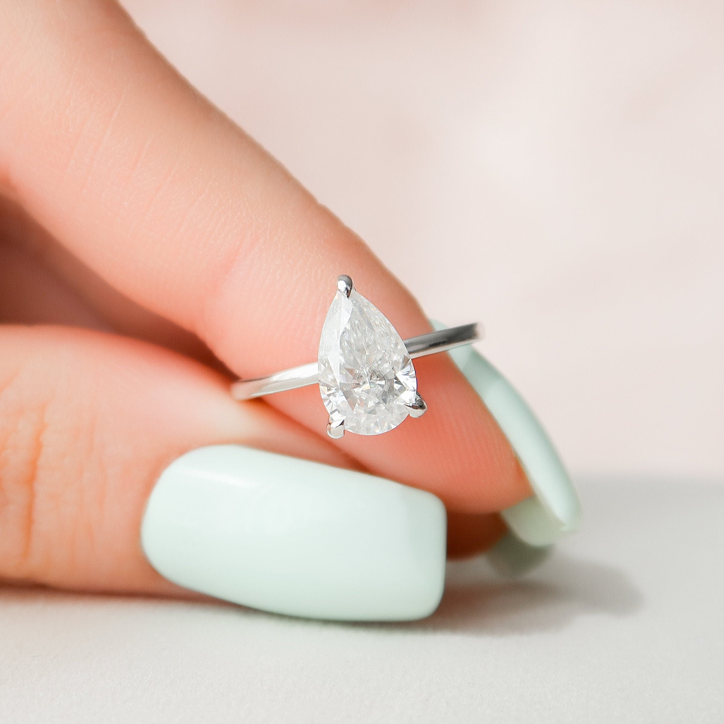 1.50 CT Pear Shaped Moissanite Hidden Halo Engagement Ring - crownmoissanite