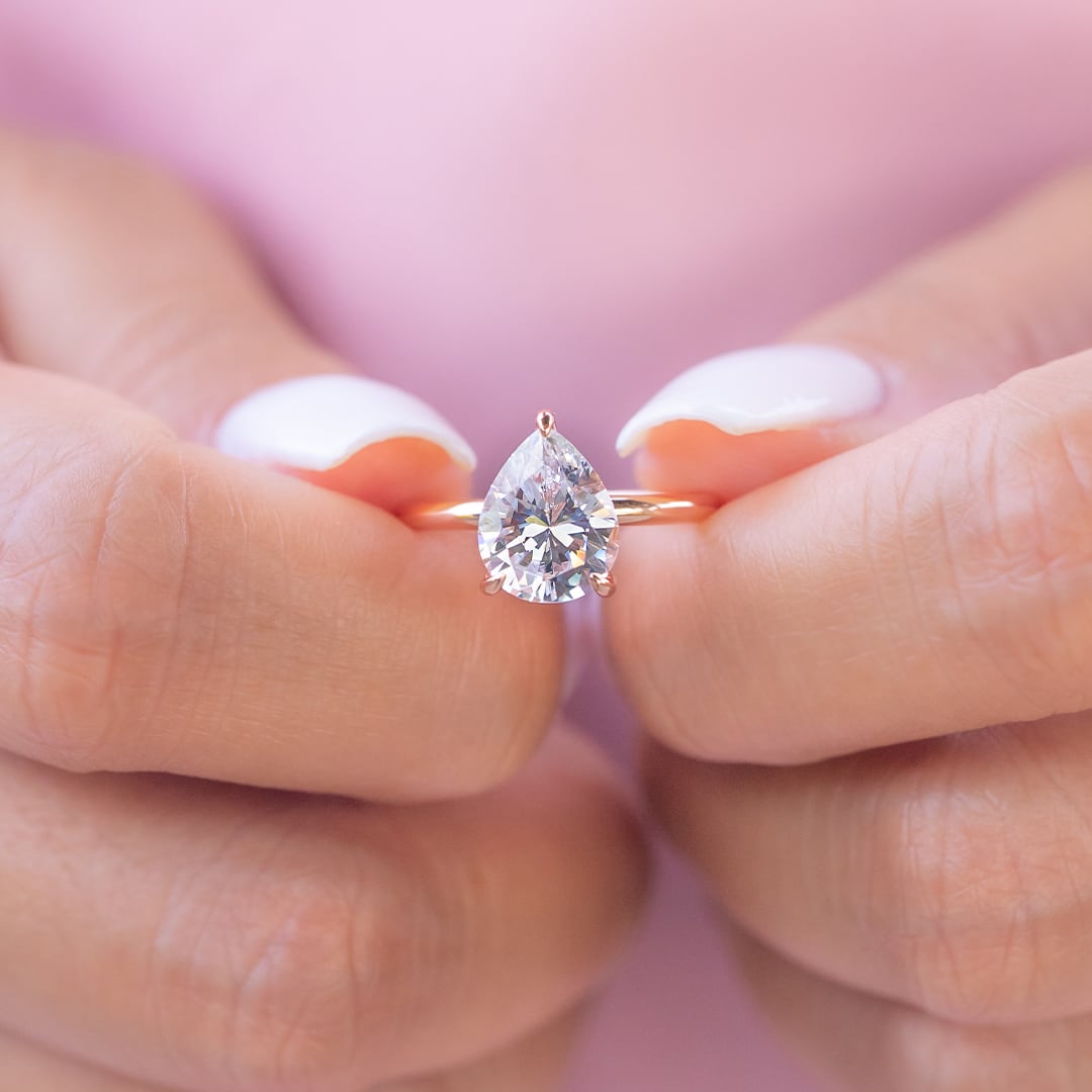 1.33 CT Pear Solitaire Moissanite Engagement Ring With Hidden Halo Setting - crownmoissanite